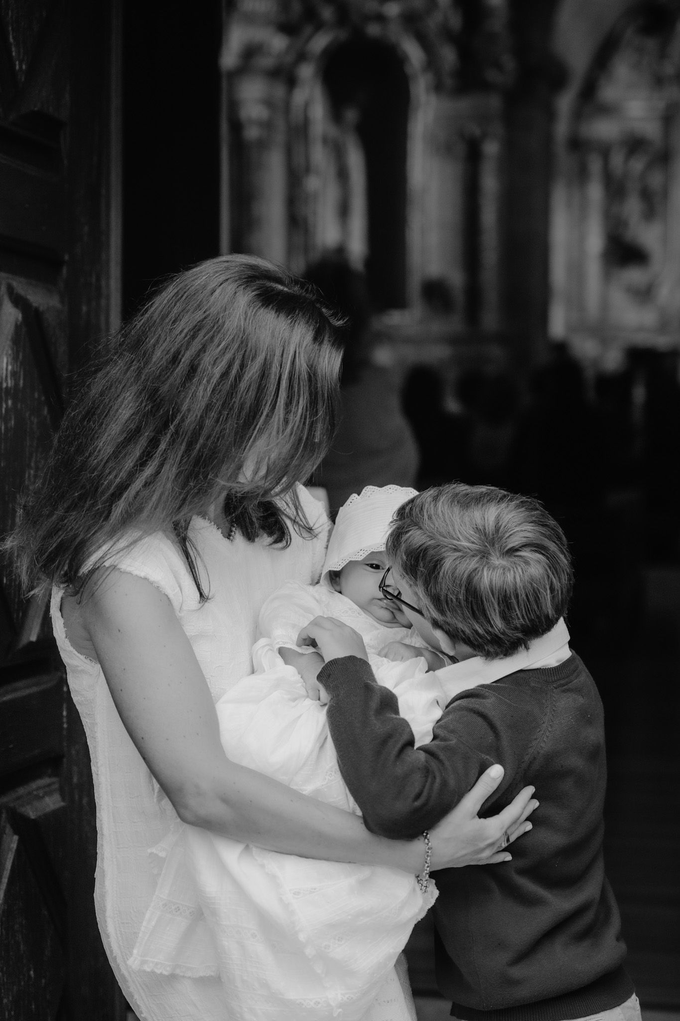 Black and white sequence showing two people embracing in an intimate moment.