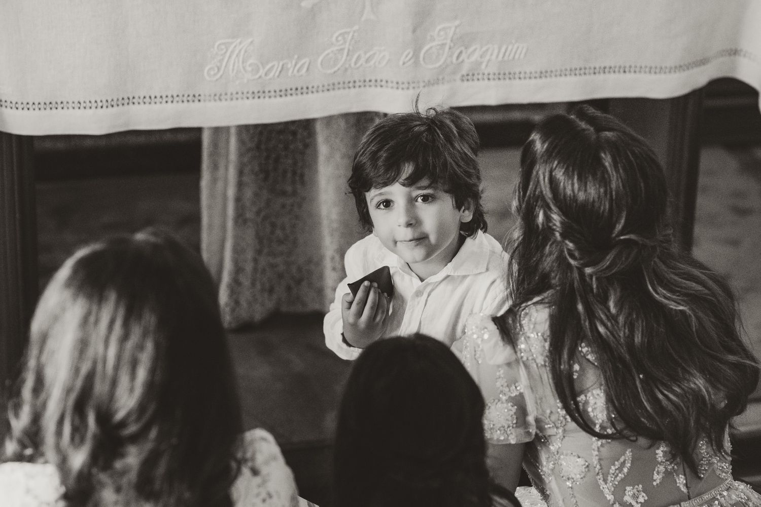 Candid black and white photographs from a religious celebration.
