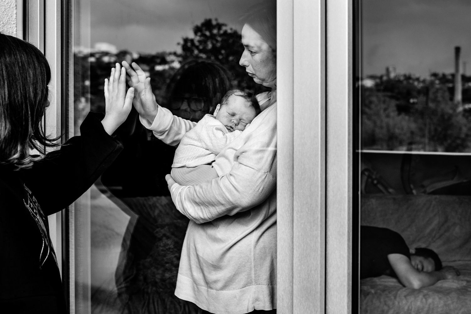 A black and white photo collage showing intimate moments between couples in various settings and poses.