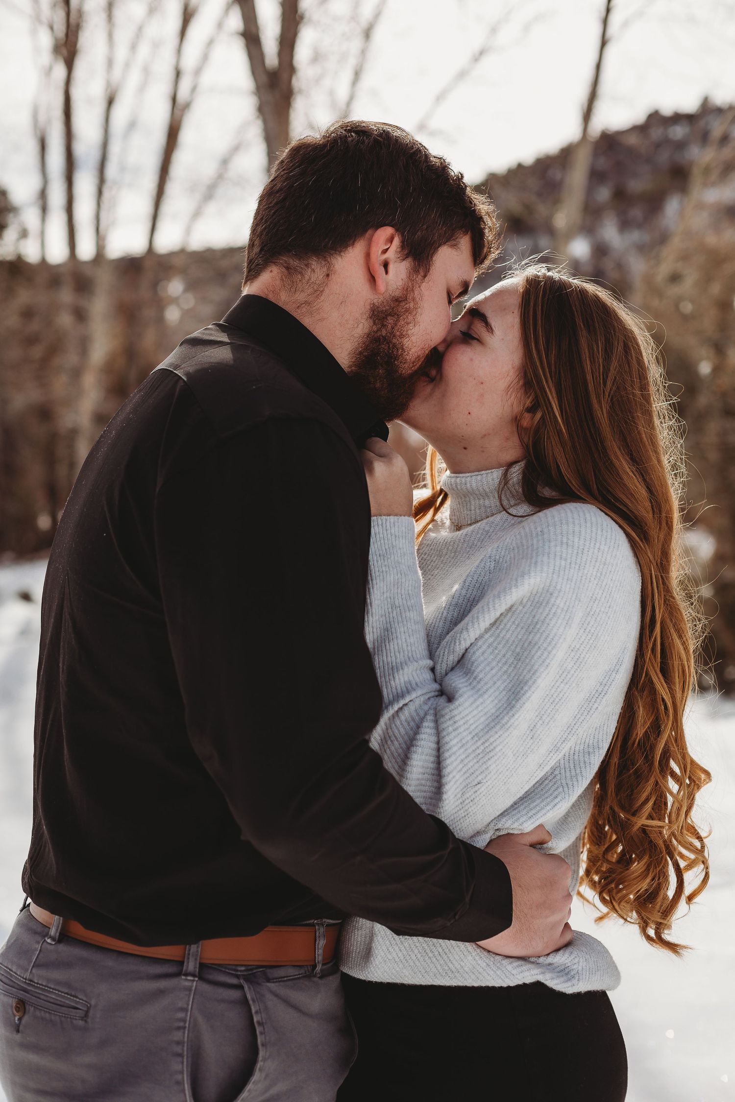 Tender winter moment captured in soft natural lighting.