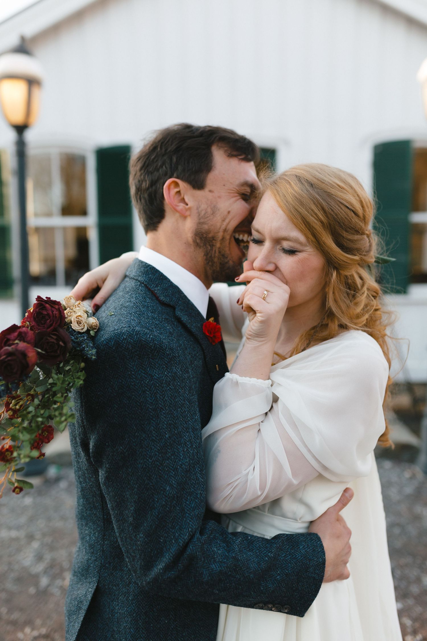 Romantic winter wedding portraits with burgundy bouquet.