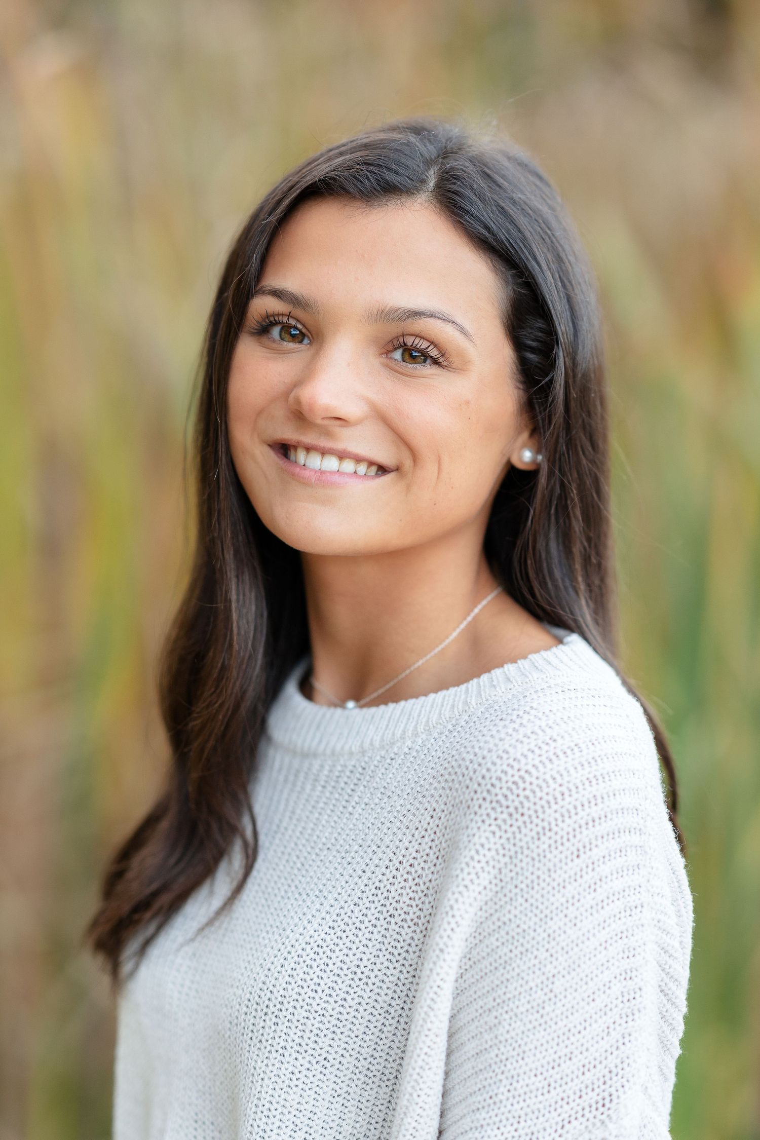 Winter portrait session in cozy white sweater.