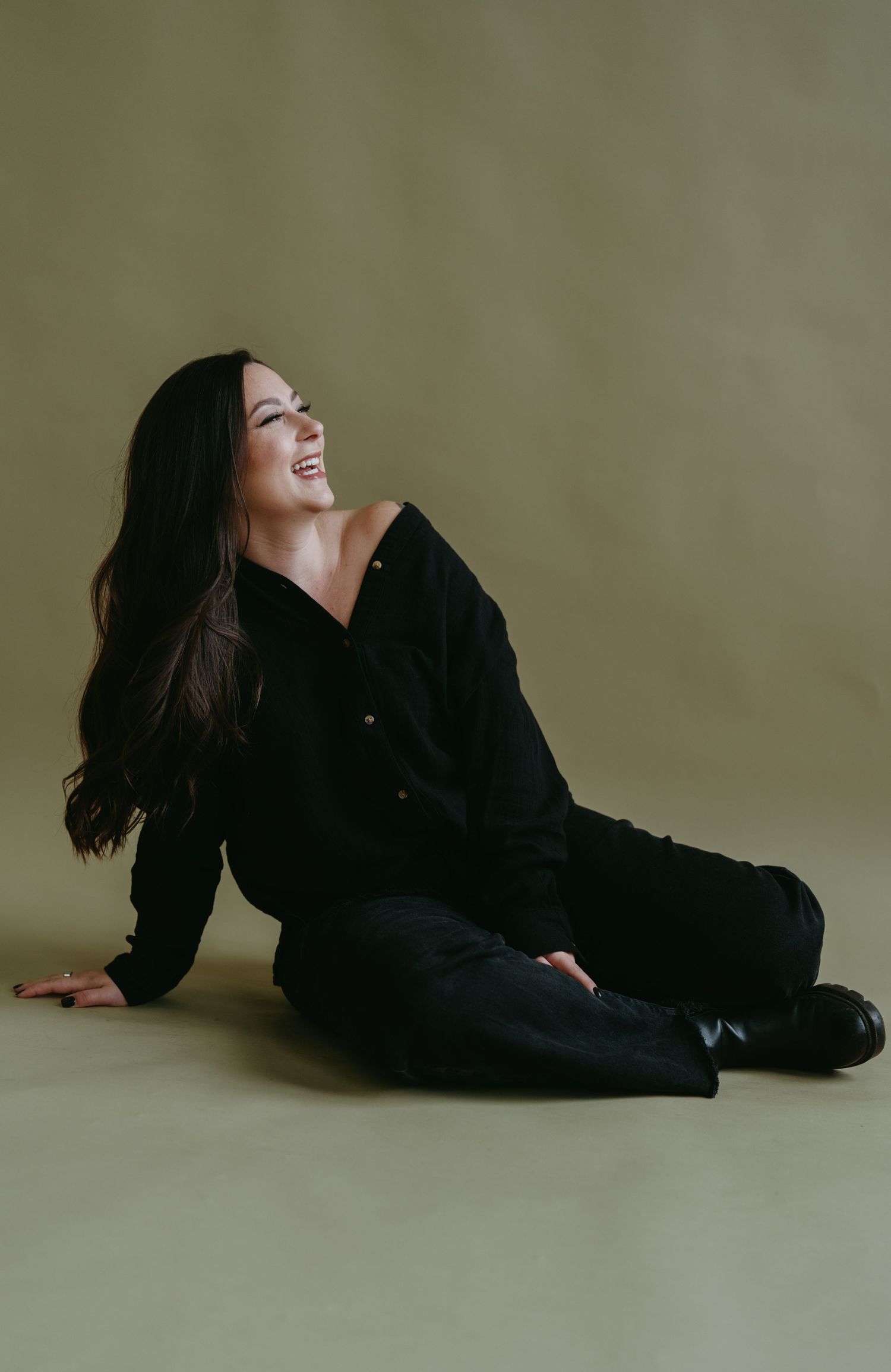 Artistic portrait series showing movement and emotion against a minimalist studio backdrop.