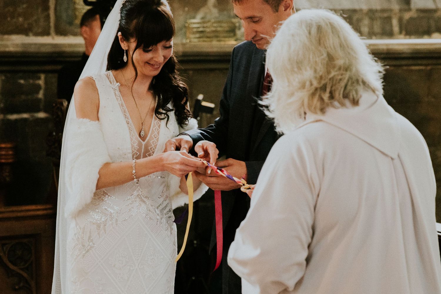 Wedding ceremony preparations in a traditional church setting.