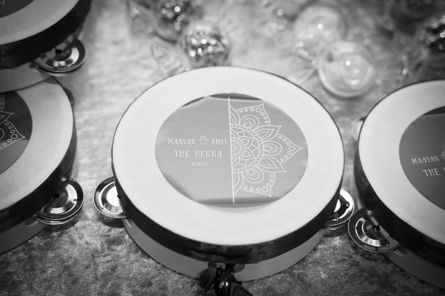 Elegant white and silver place settings arranged on a formal dining table.