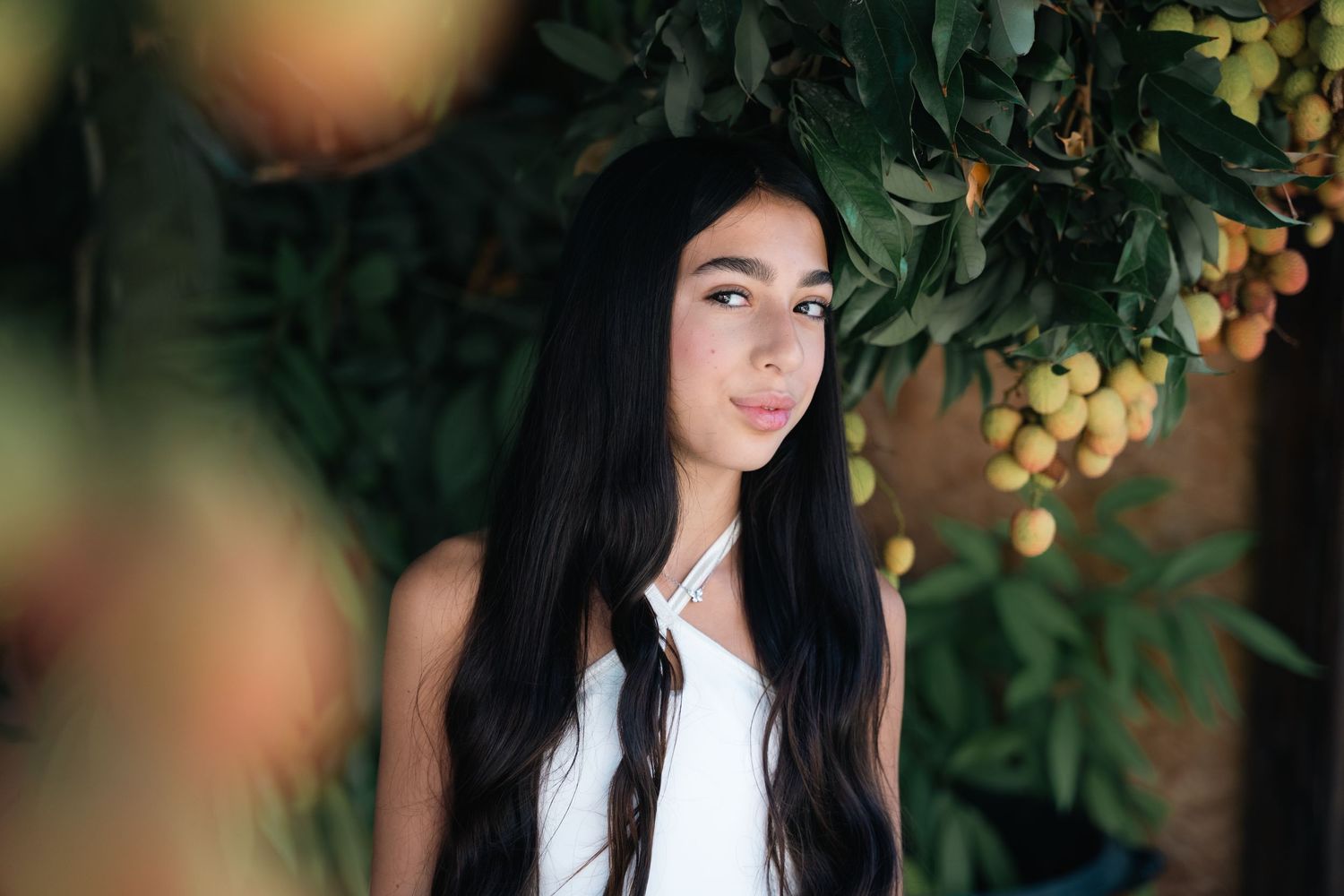 Elegant outdoor photography with lush foliage and soft lighting effects.