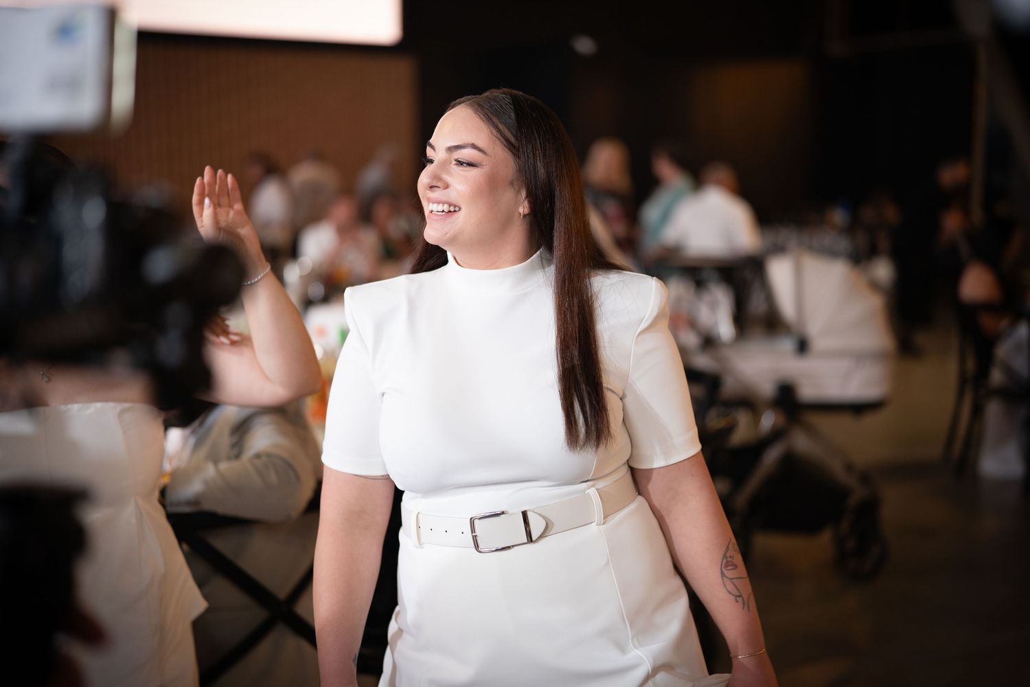 Celebration photos showing joyful moments at an indoor event space.
