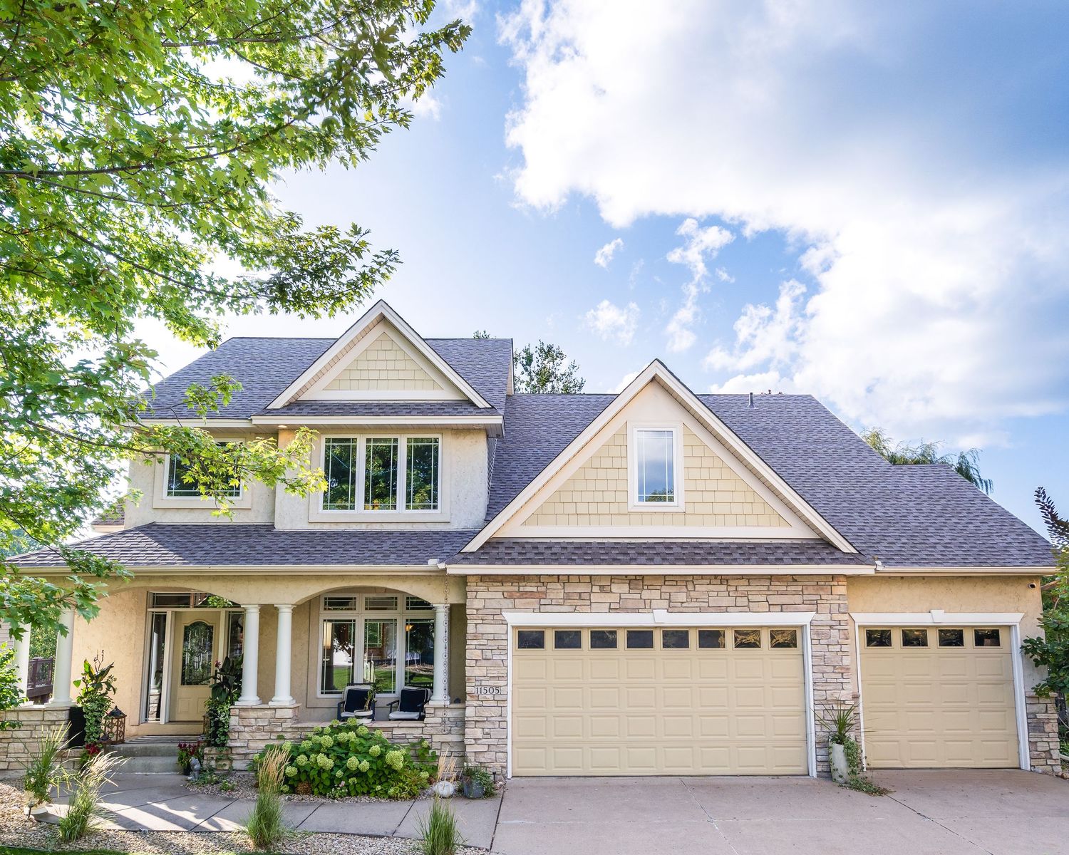 Exterior photo sequence showing multiple angles of a modern beige and stone ranch-style home with attached garage.