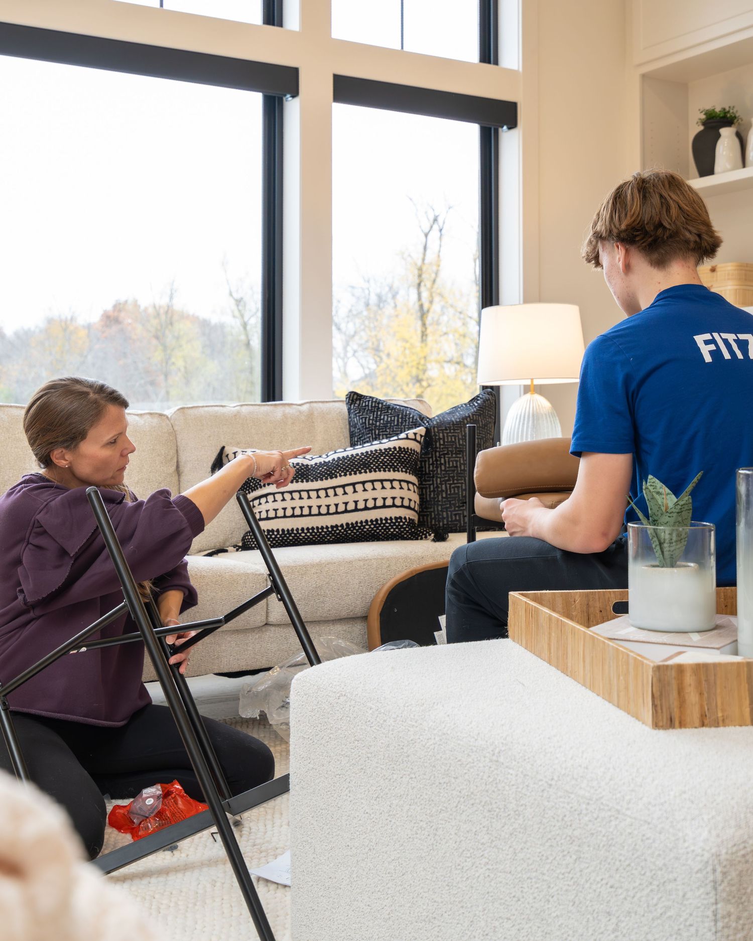 A series of four connected photos showing a person stretching and exercising on a physical therapy table.