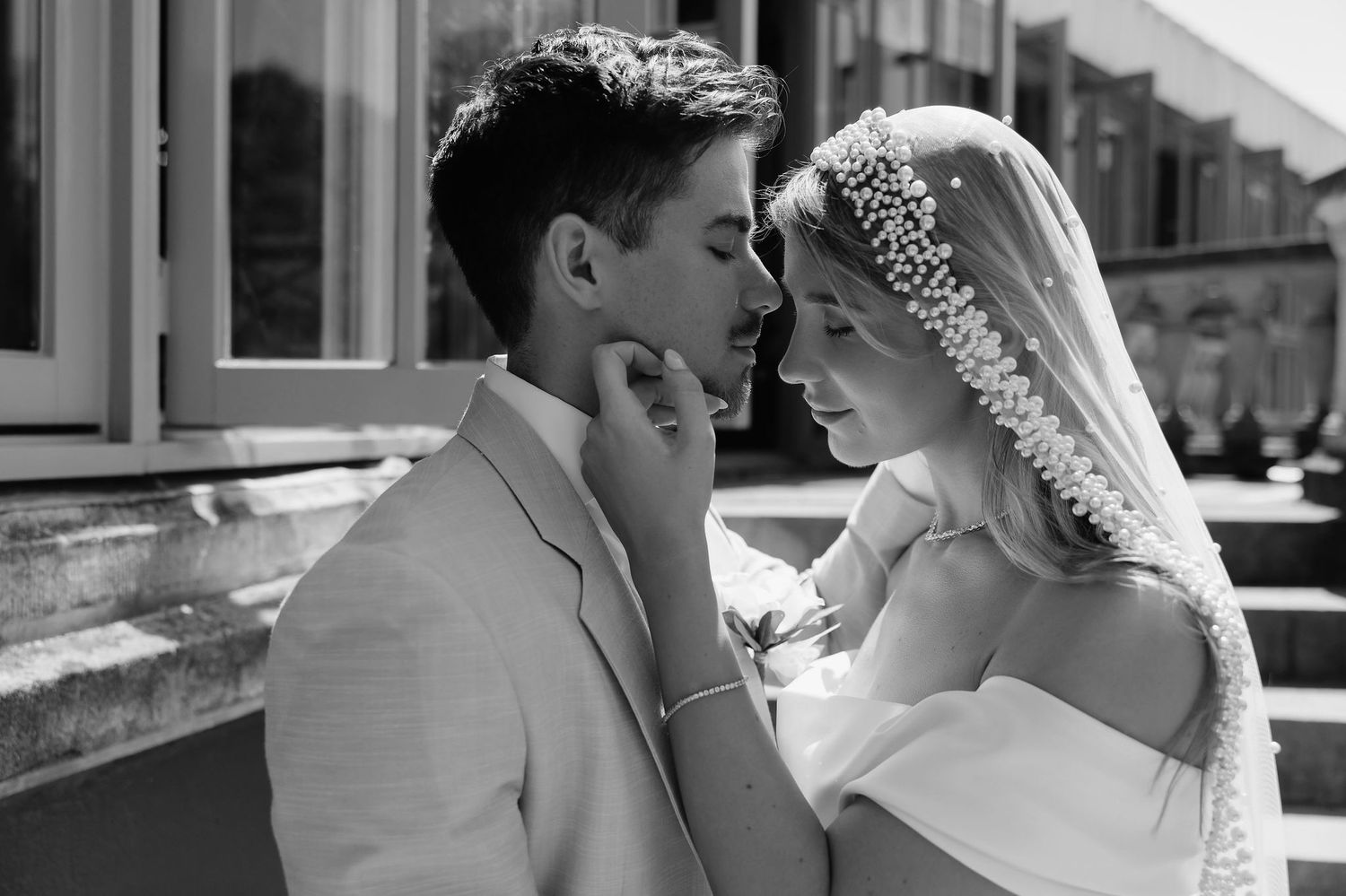 Romantic wedding couple portraits showing intimate moments and tender embraces.