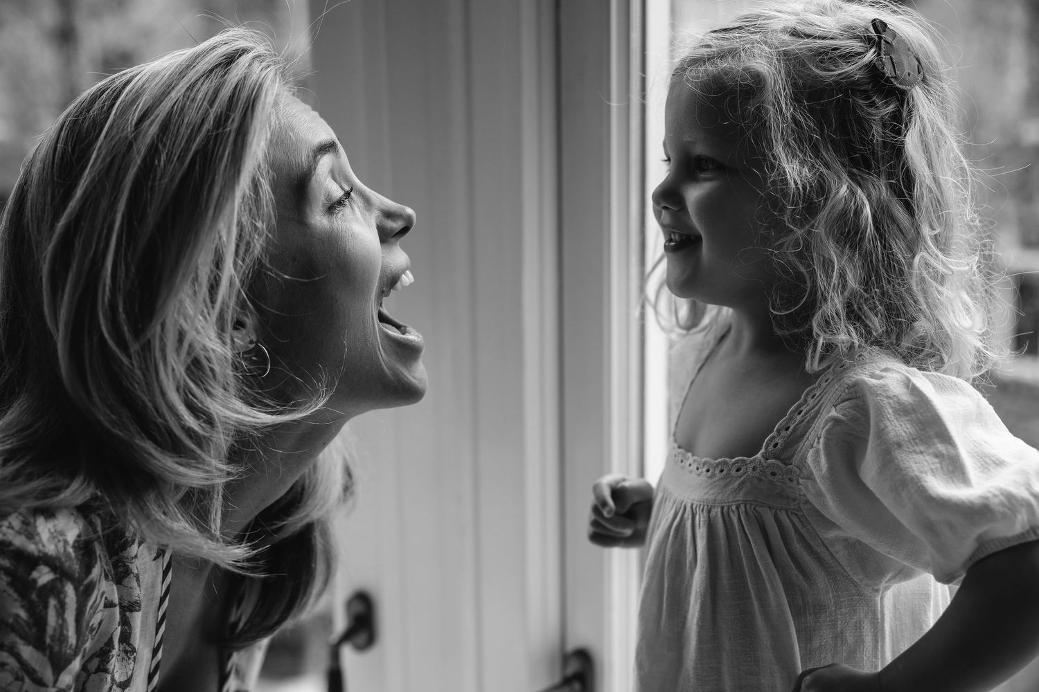 A sequence of black and white close-up shots showing different emotional expressions and poses.