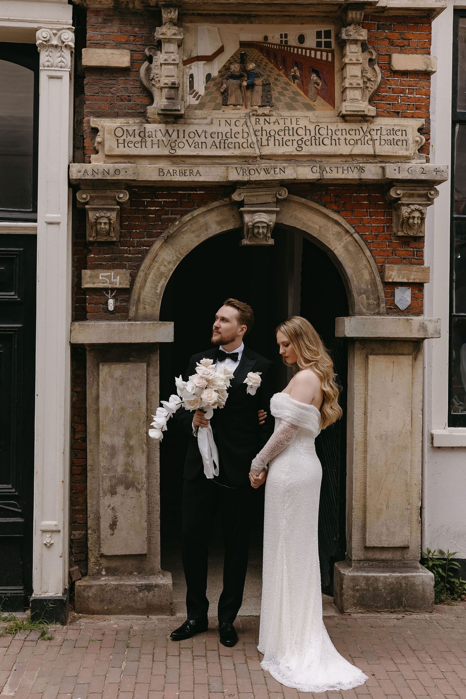 A wedding couple poses in front of historic brick architecture in three artistic split frames.
