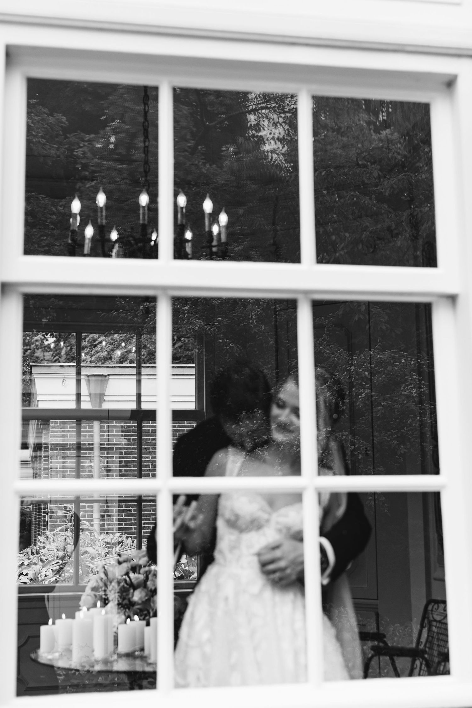Series of window reflections showing wedding preparations through white window panes.
