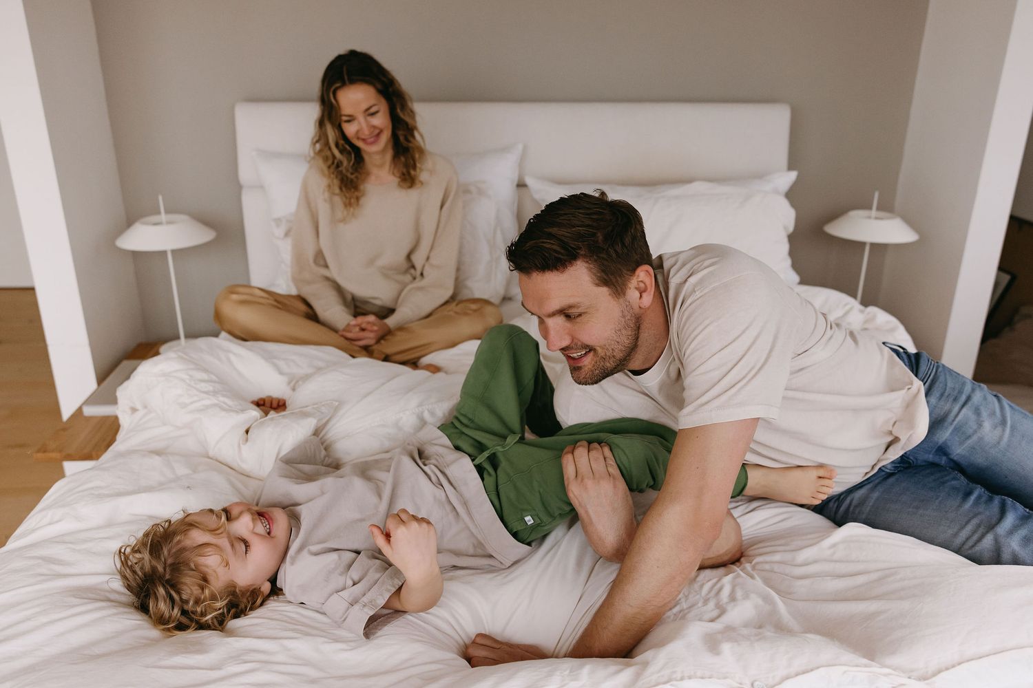Collection of candid lifestyle photographs showing intimate moments in a bright bedroom setting.