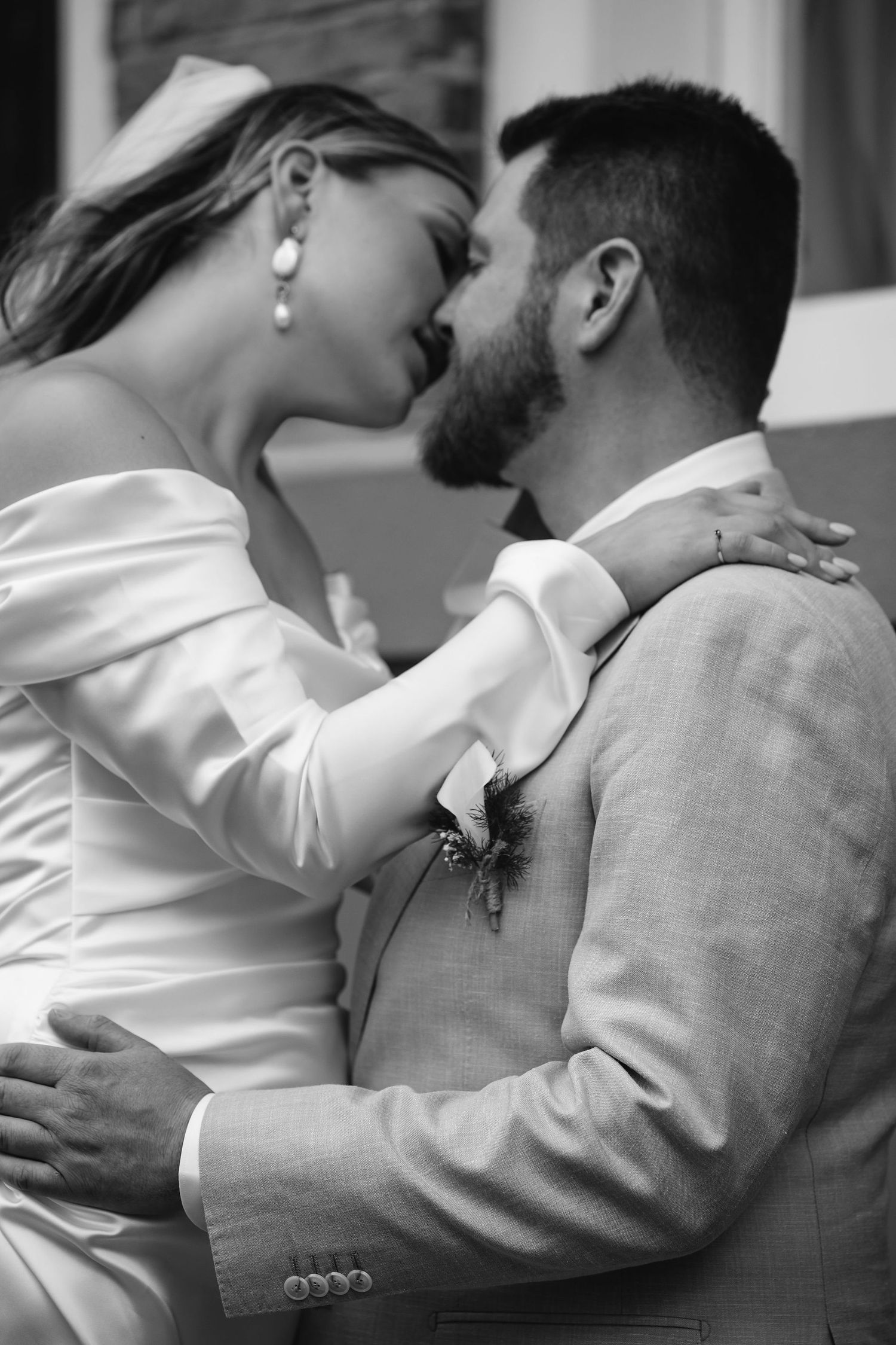 Romantic black and white photo sequence of couple sharing intimate moments.