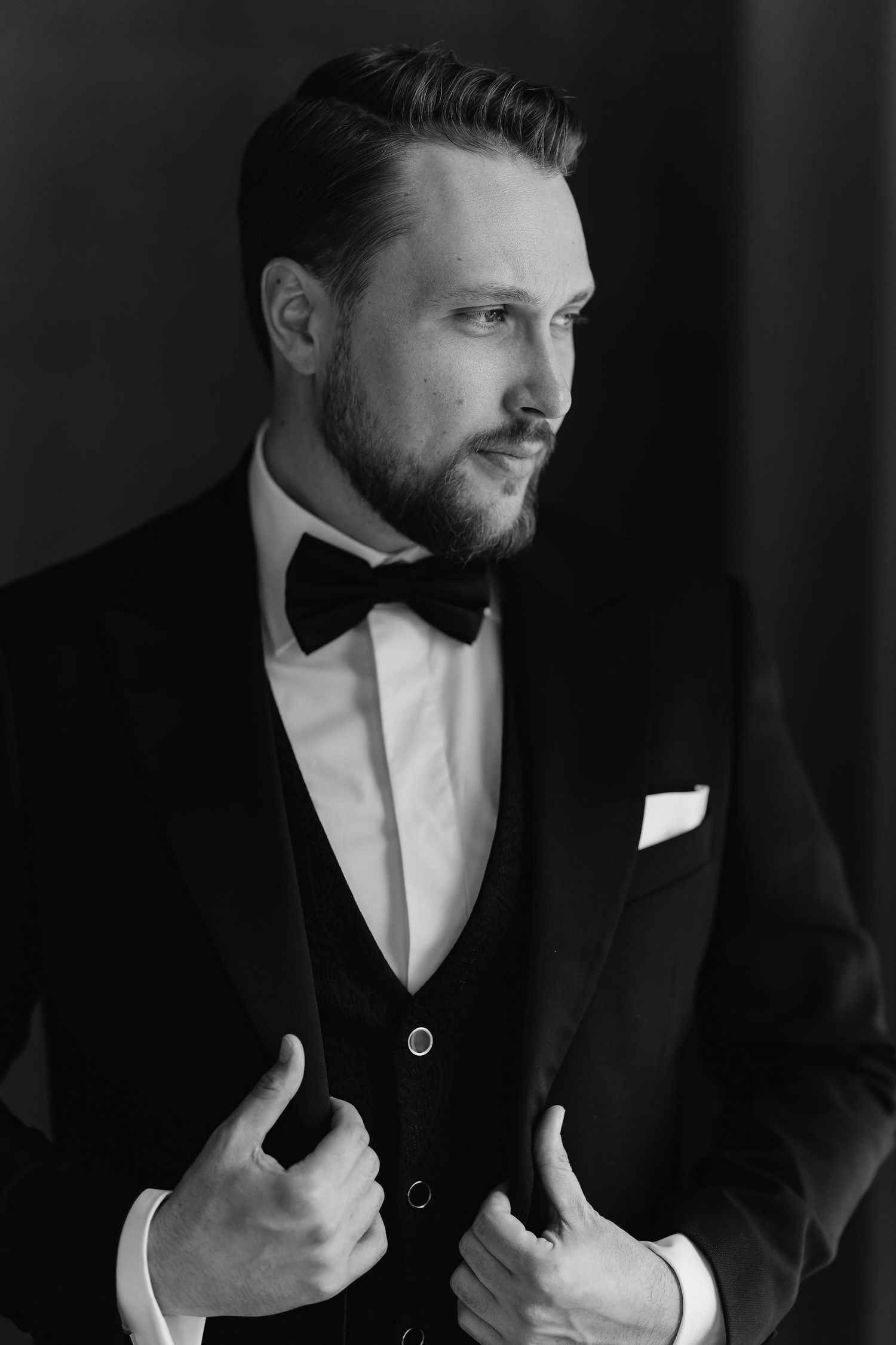 Dramatic black and white portrait series showing details of formal attire and accessories.