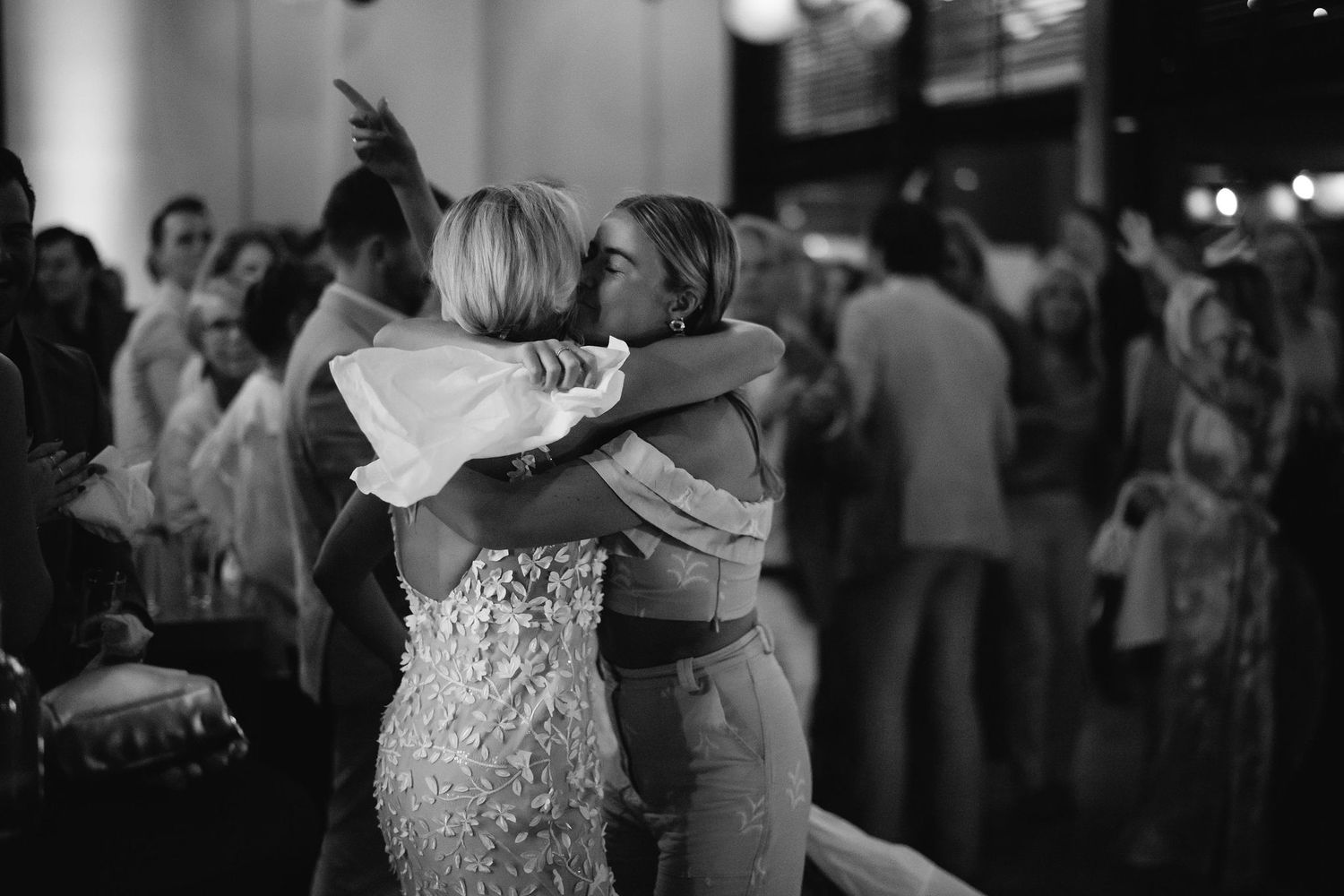 Romantic dance moments captured during an evening wedding reception.