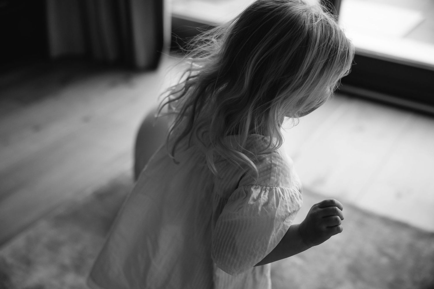 Artistic black and white close-up shots with soft window lighting.