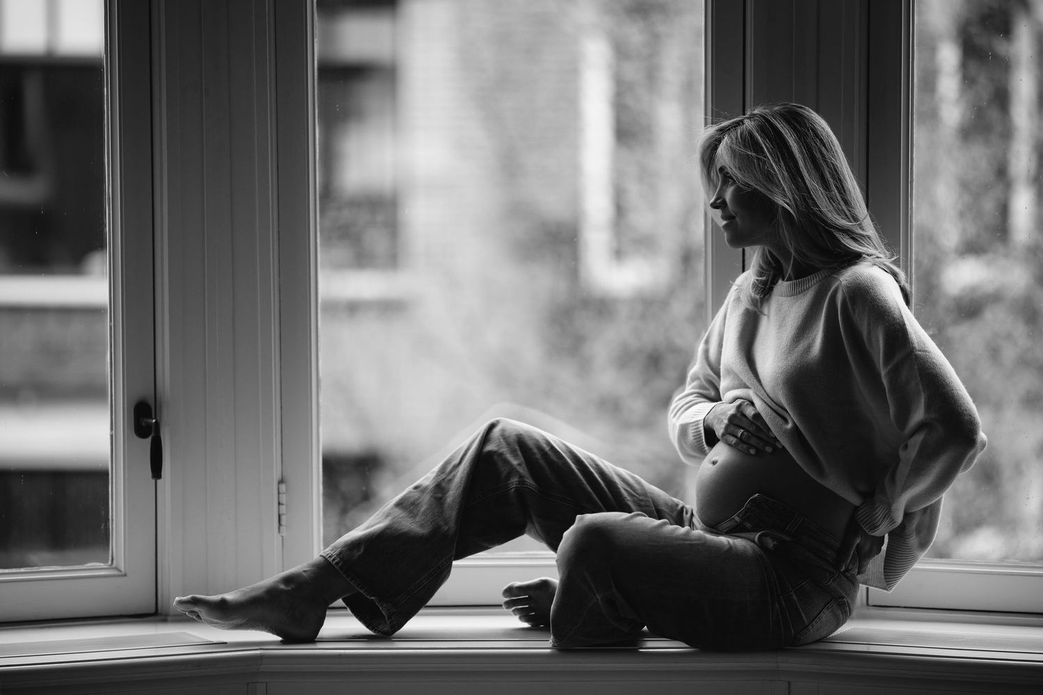 Black and white photos of person sitting by window in contemplative poses.