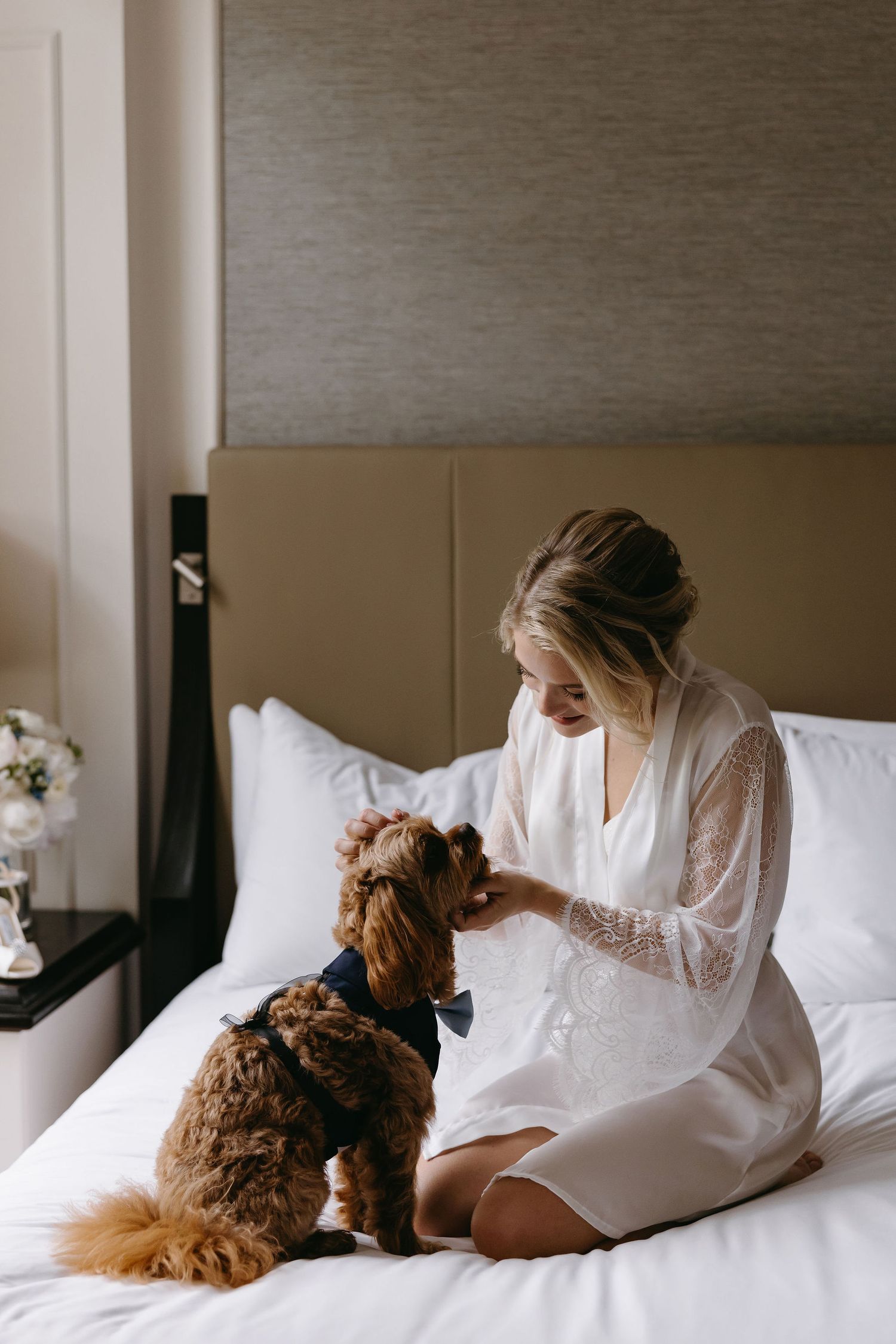 Morning preparation scenes in a hotel room with white bedding and warm natural light.