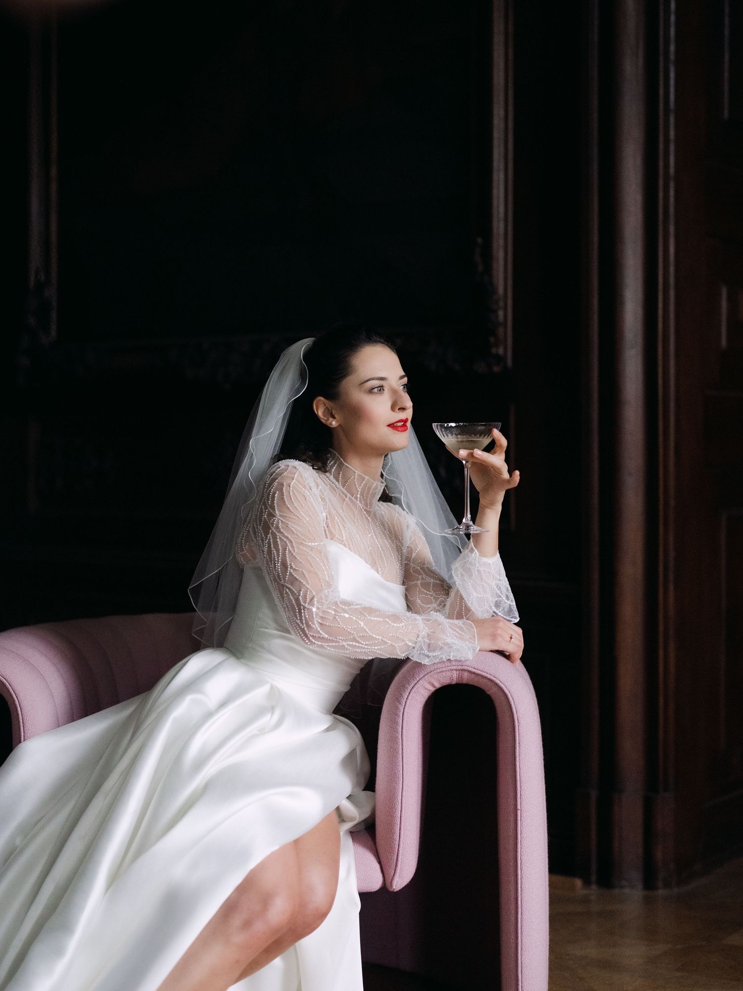 Bridal portrait in an elegant Austrian castle featuring timeless architecture and luxurious details, captured during a destination wedding