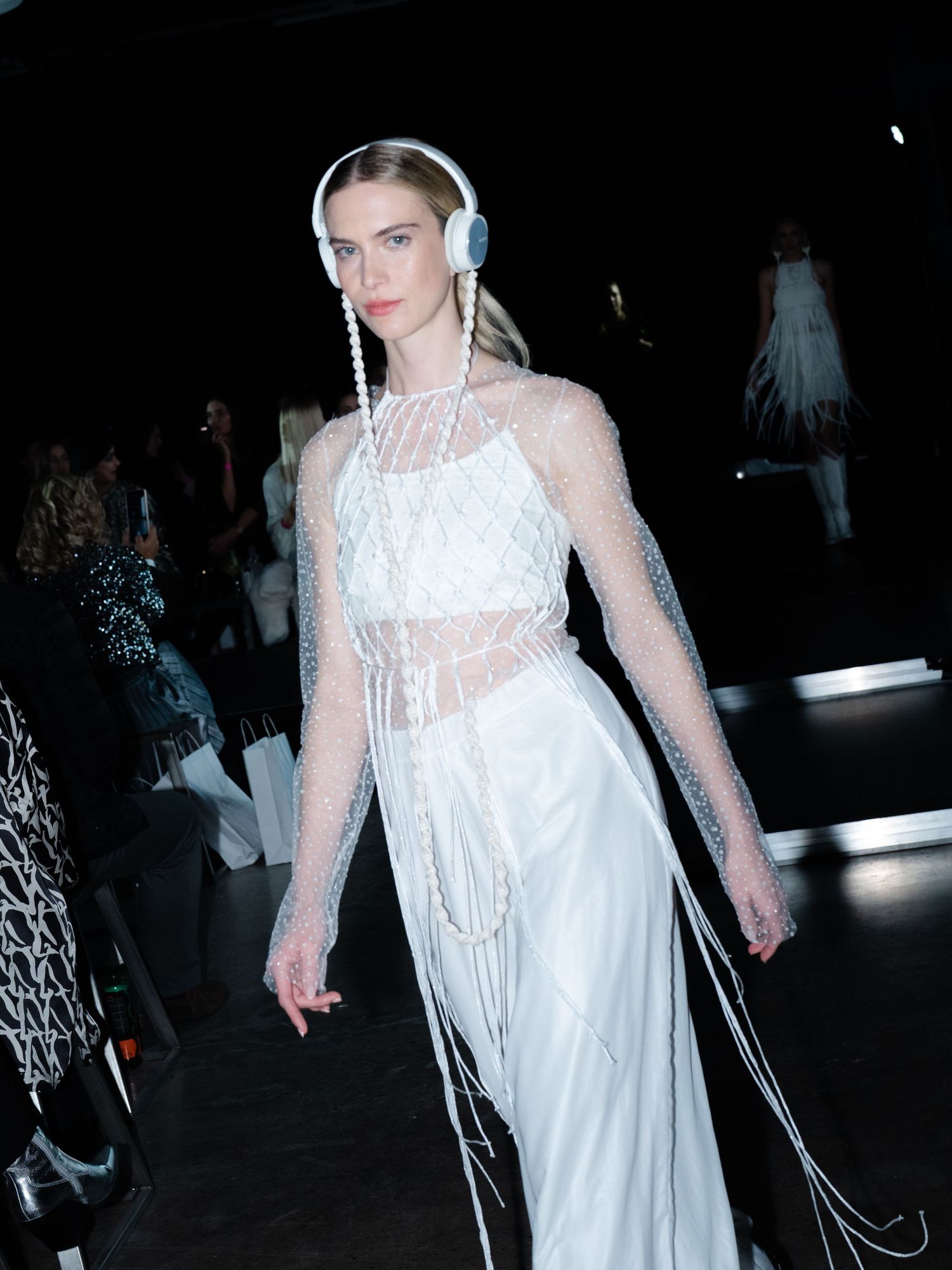 Runway photo from Budapest Bridal Fashion Show 2024 showcasing DADO Macrame Wonders bridal couture, featuring intricate and elegant designs