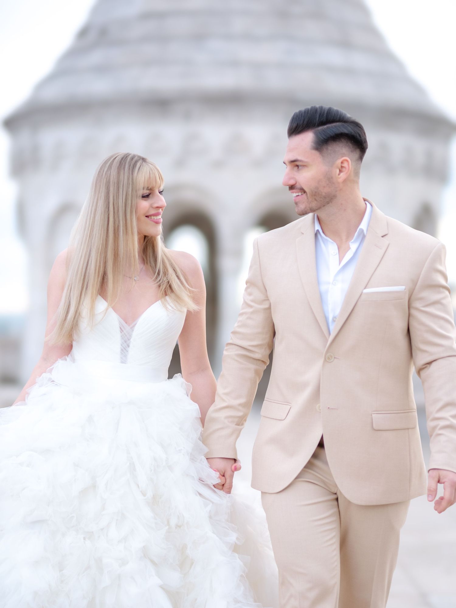 Graceful couple posing romantically at Fisherman’s Bastion during an elopement shoot, beautifully captured by Hang Pham Photography
