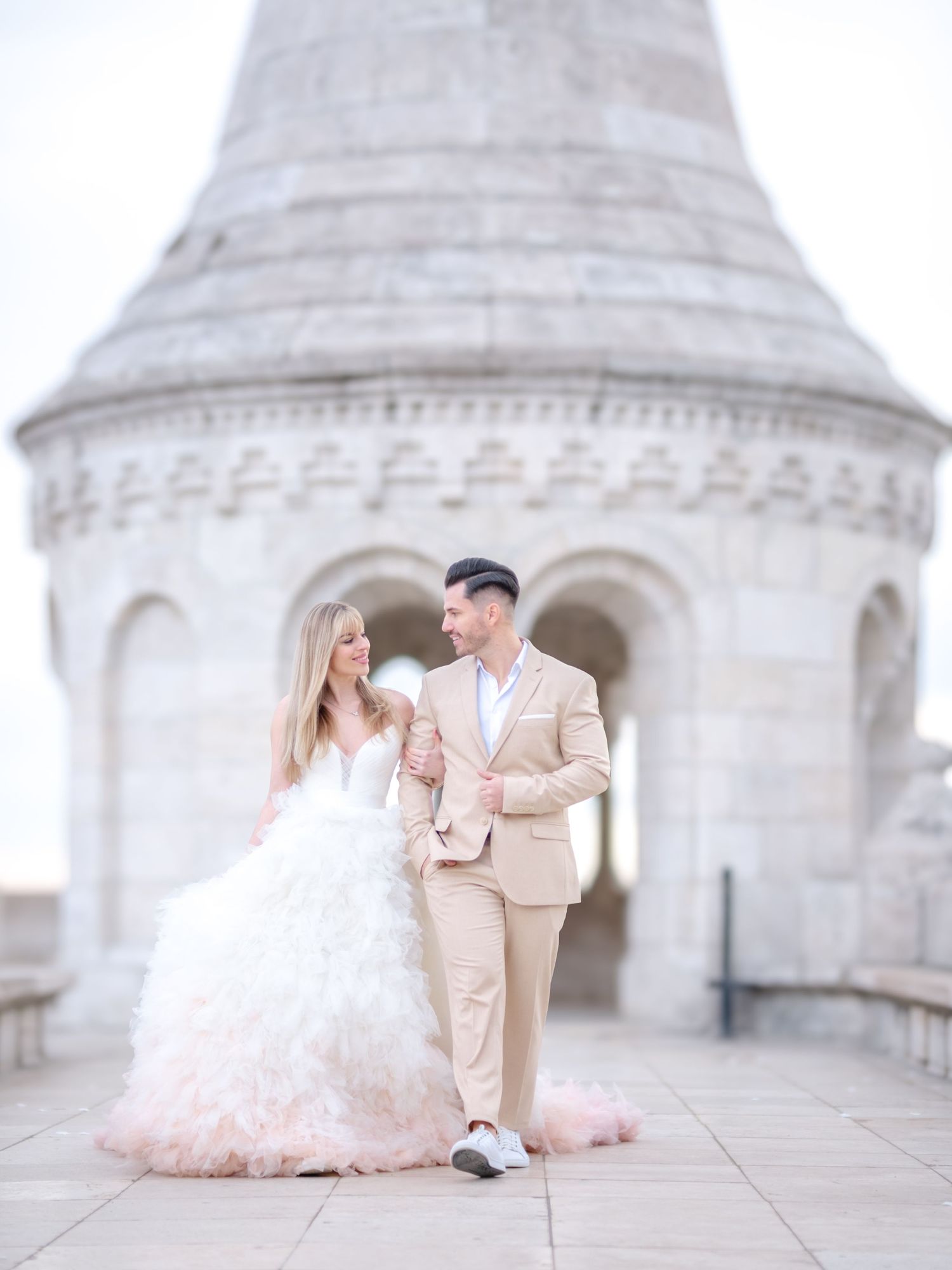 Graceful couple posing romantically at Fisherman’s Bastion during an elopement shoot, beautifully captured by Hang Pham Photography