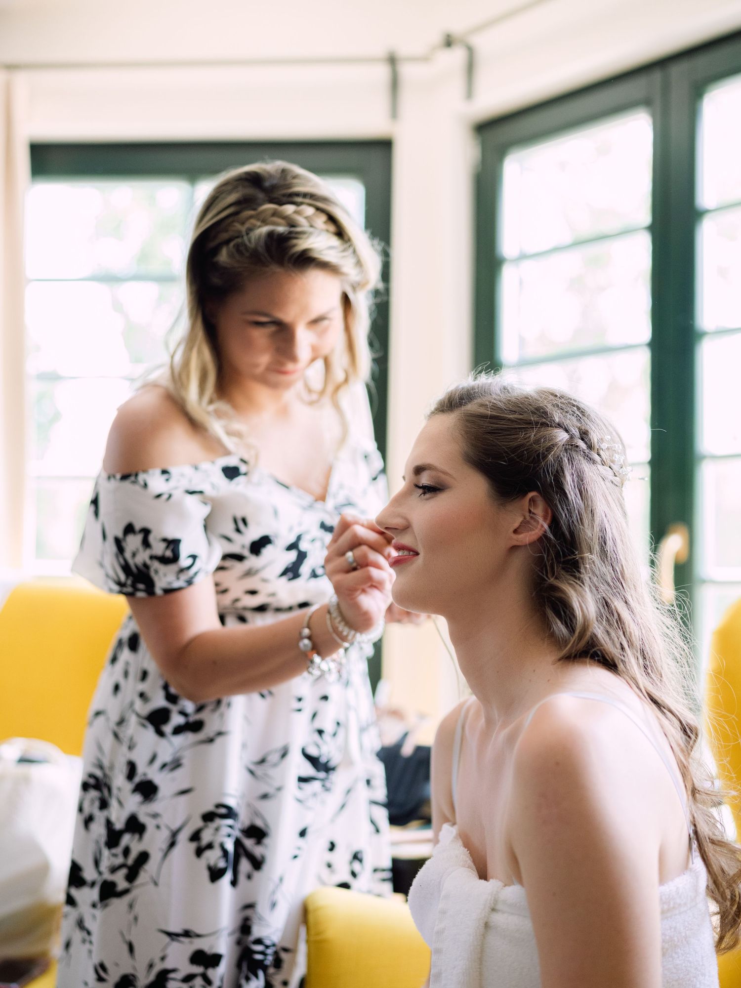 Bride getting ready for an intimate Budapest wedding, preparing with elegance and charm in a serene setting before the special day