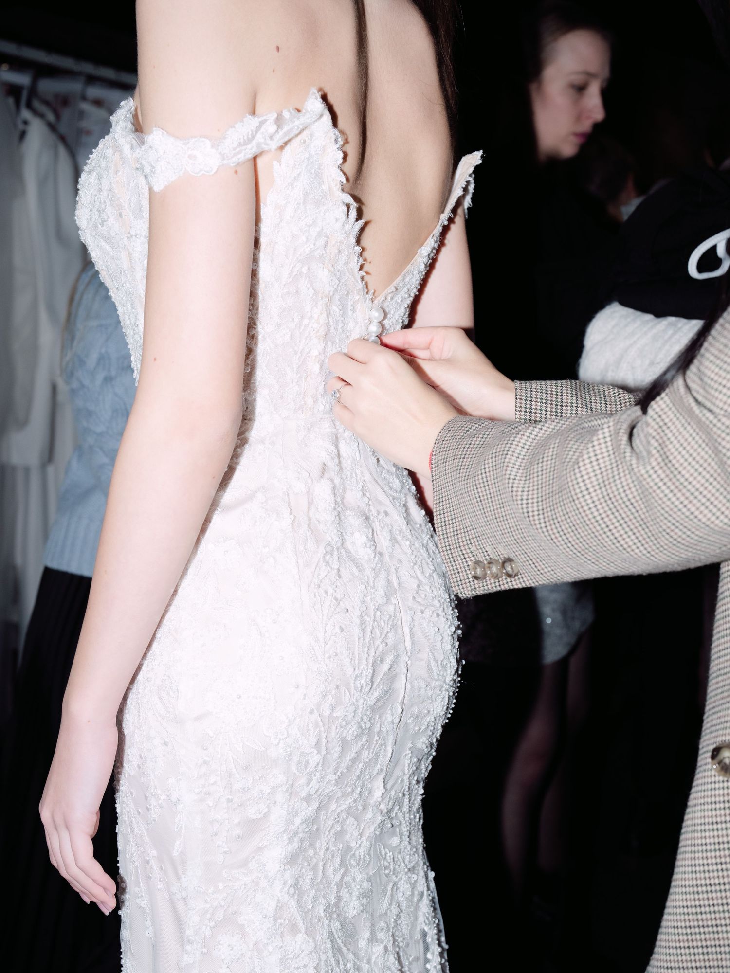Backstage at Budapest Bridal Fashion Show 2024 featuring bridal couture and models preparing for a stunning runway presentation