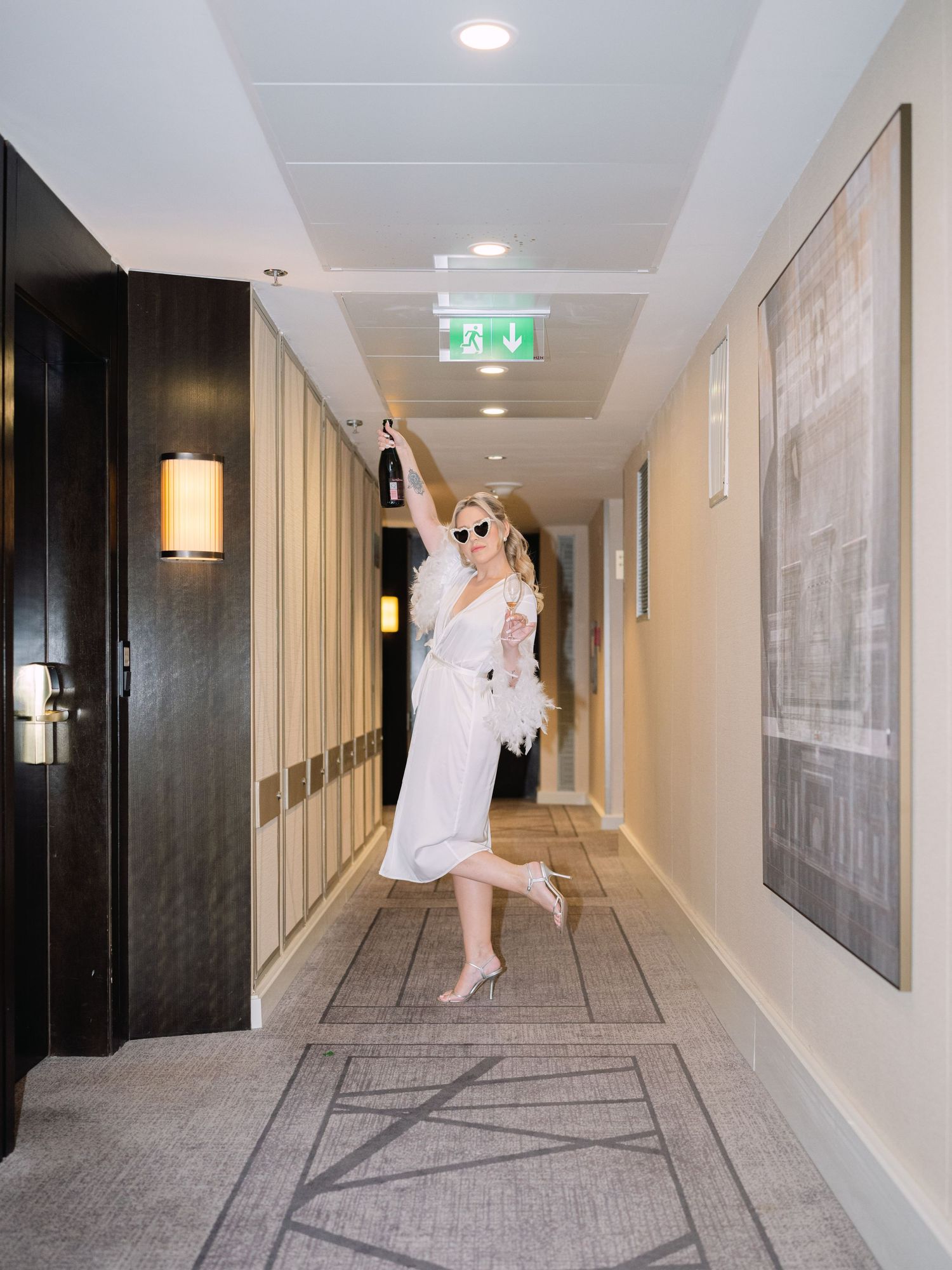 Creative flash shots of a captivating bride in a Hilton Hotel in Budapest, styled for an intimate luxury destination wedding