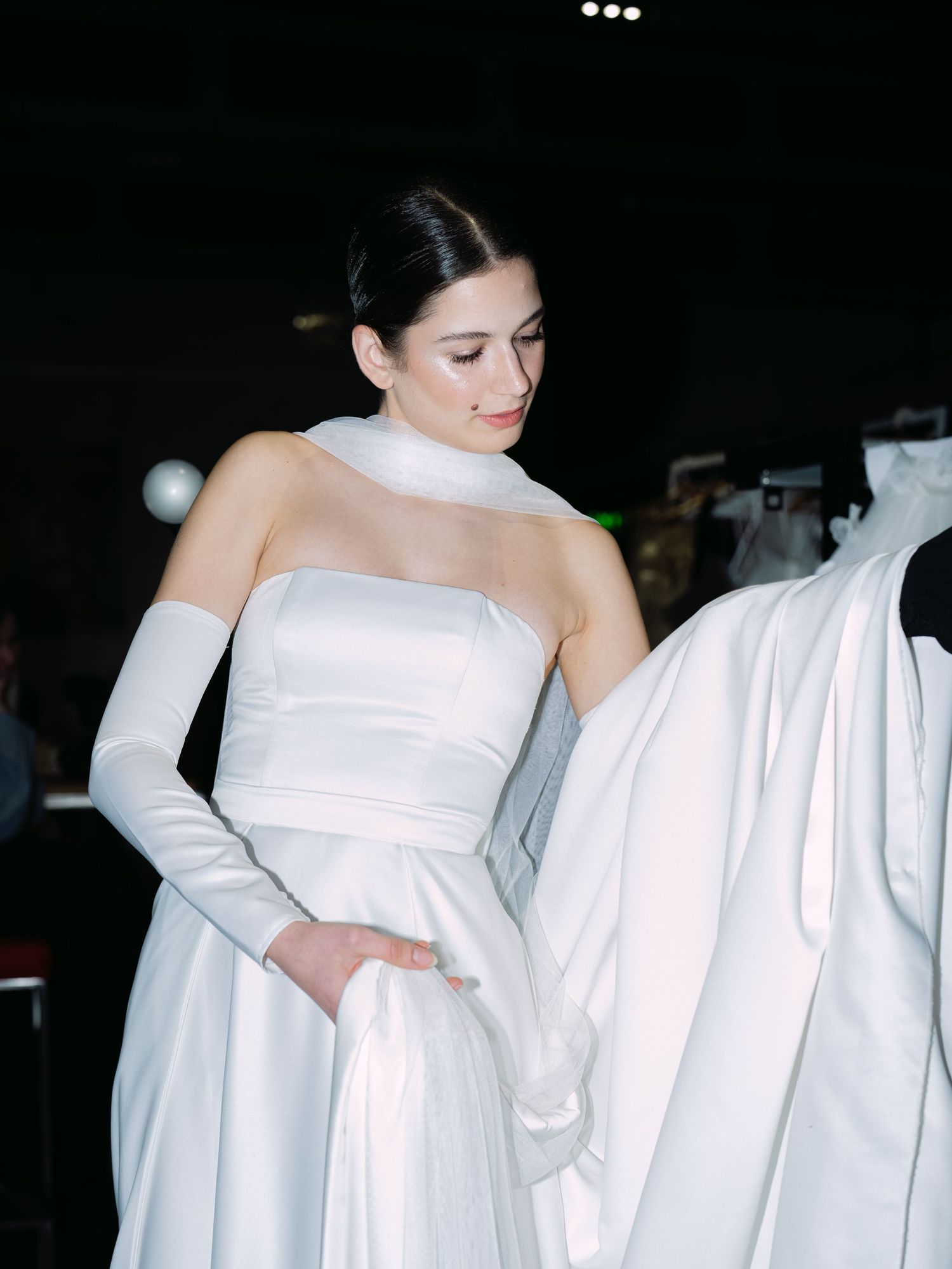 Backstage at Budapest Bridal Fashion Show 2024 featuring bridal couture and models preparing for a stunning runway presentation