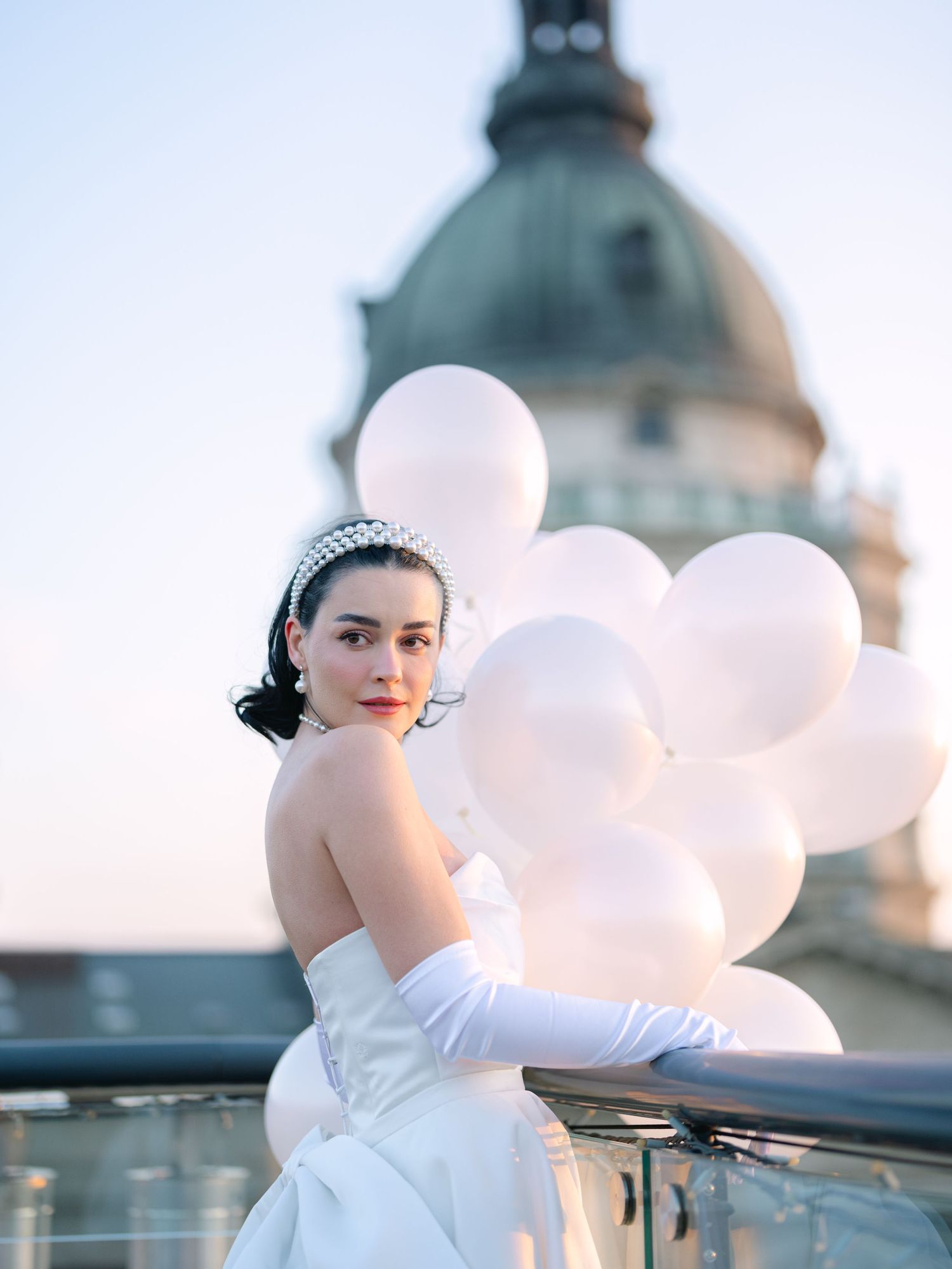 Elegant bride in a Rami Wedding Dress posing at High Note Sky Bar during a destination wedding editorial, captured by Hang Pham Photography