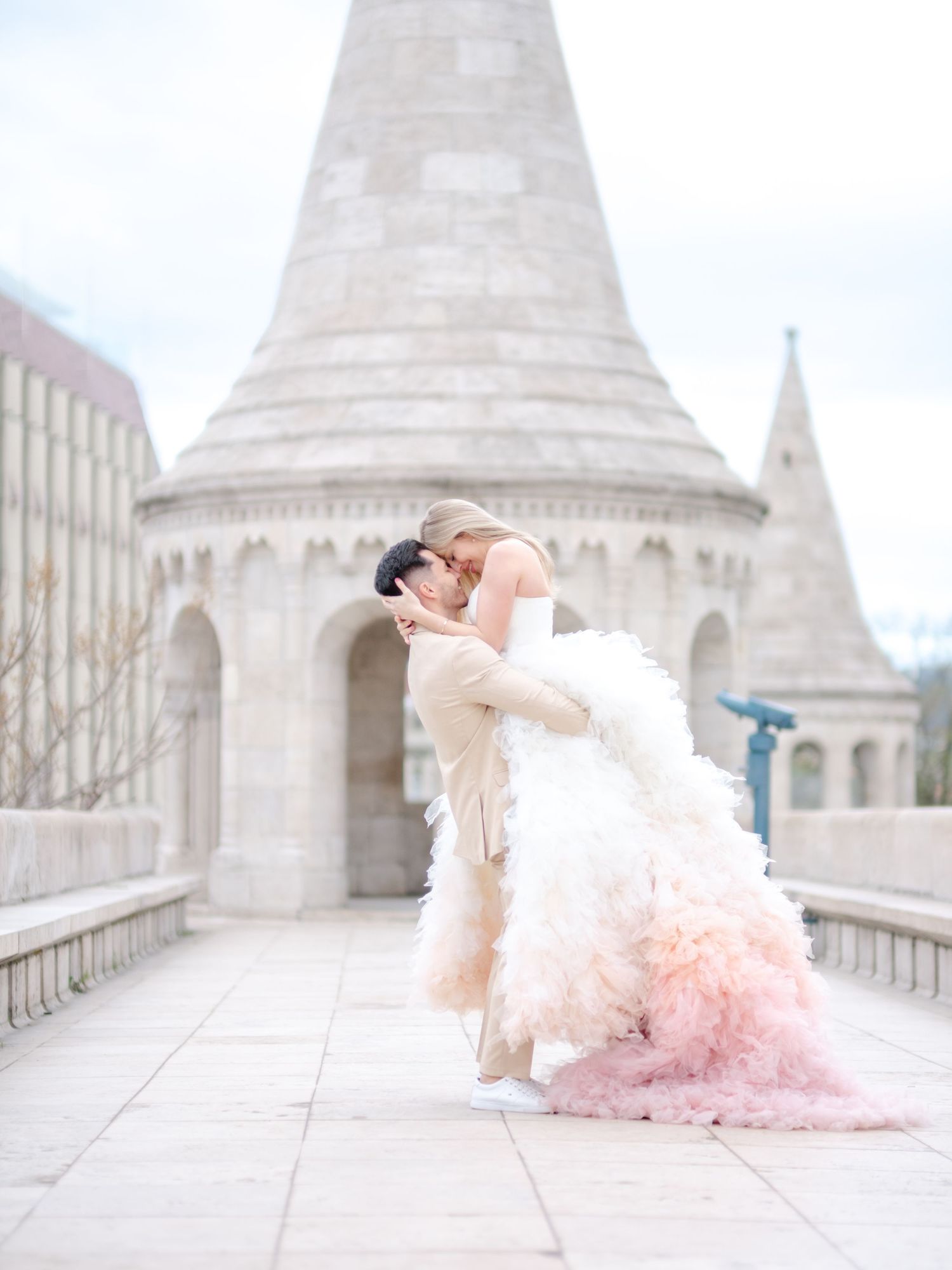 Graceful couple posing romantically at Fisherman’s Bastion during an elopement shoot, beautifully captured by Hang Pham Photography