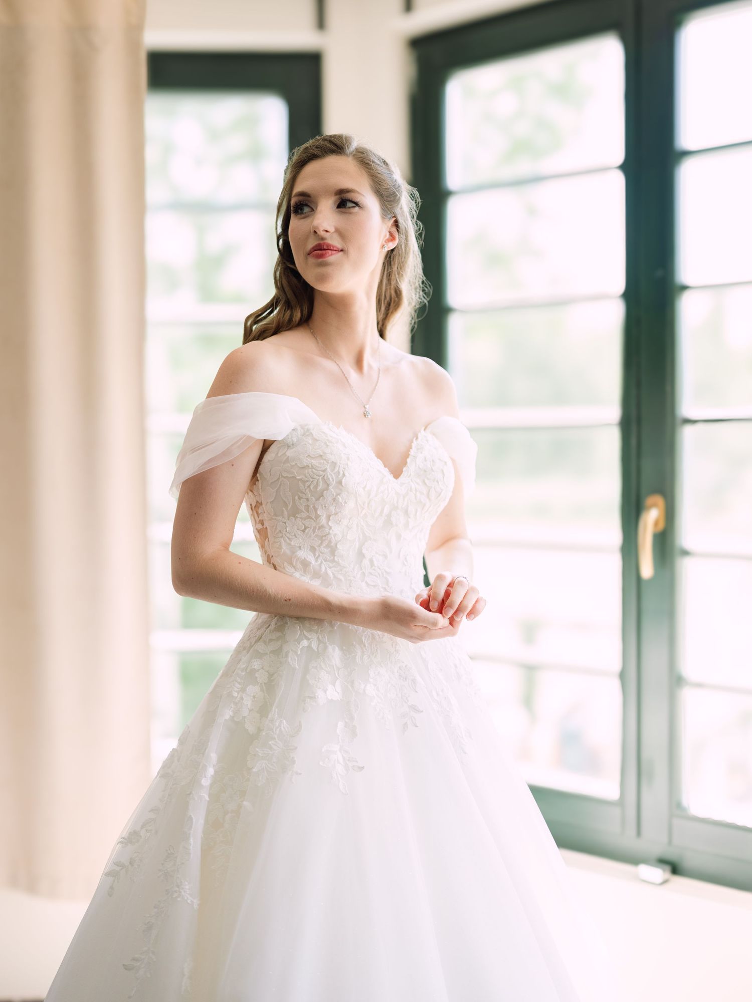 Bride getting ready for an intimate Budapest wedding, preparing with elegance and charm in a serene setting before the special day