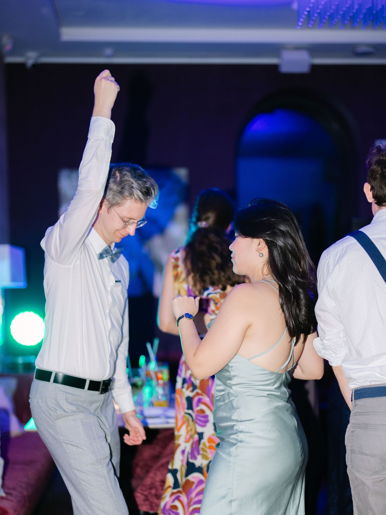 Vibrant party scene at an intimate destination wedding hosted at Aranybástya Restaurant in Budapest, capturing joyful celebration moments