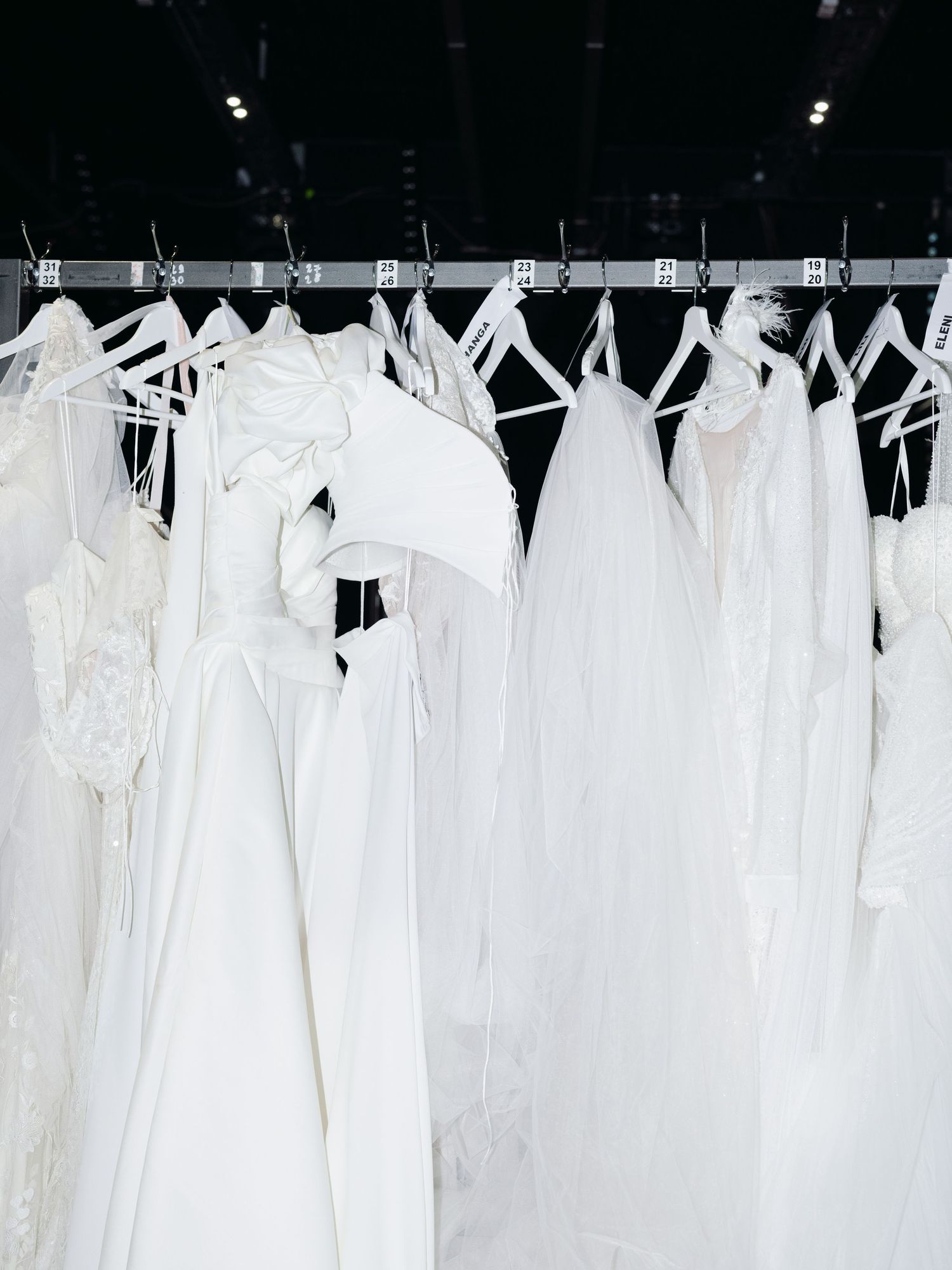 Backstage at Budapest Bridal Fashion Show 2024 featuring bridal couture and models preparing for a stunning runway presentation