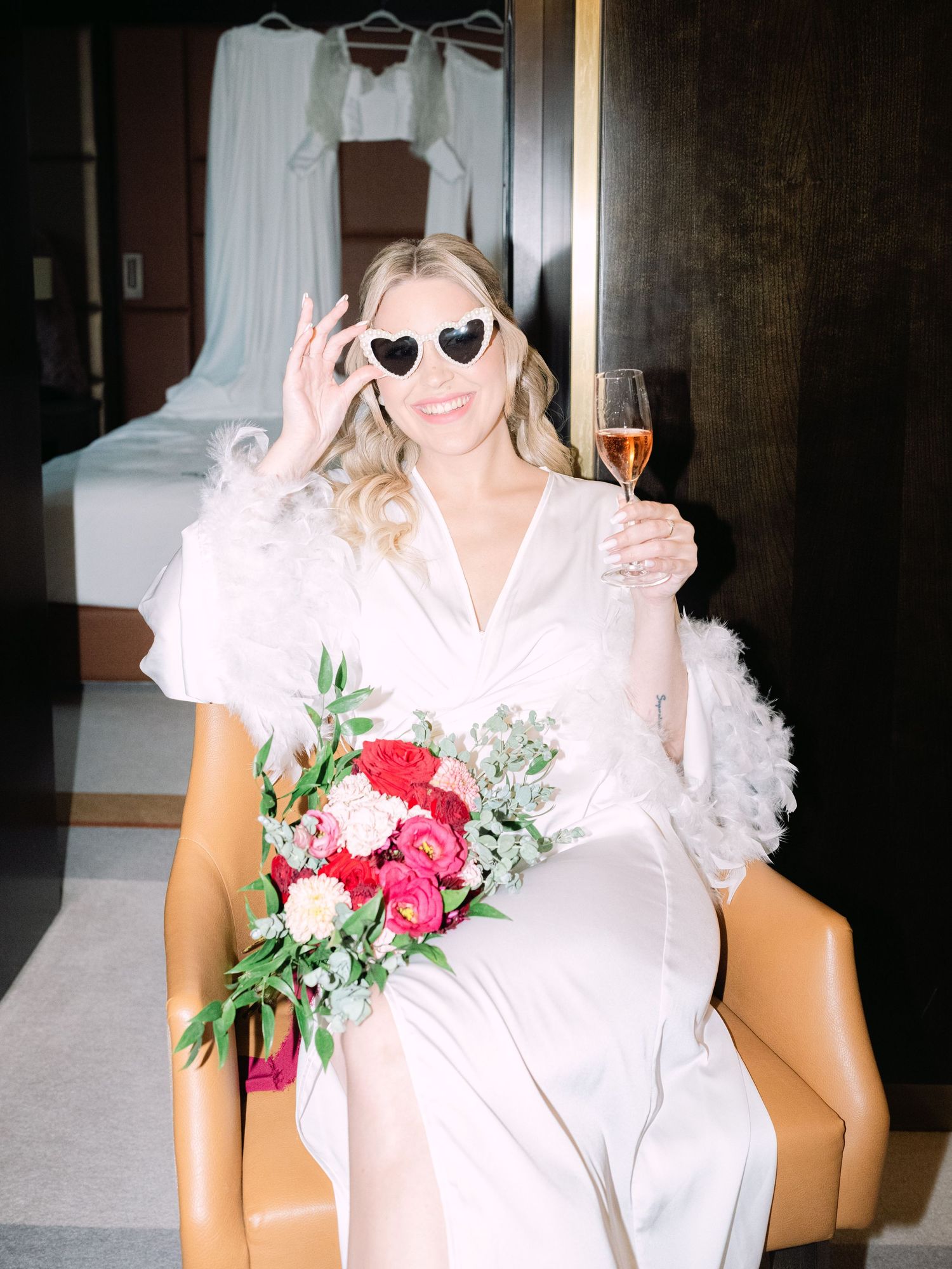 Creative flash shots of a captivating bride in a Hilton Hotel suite in Budapest, styled for an intimate luxury destination wedding