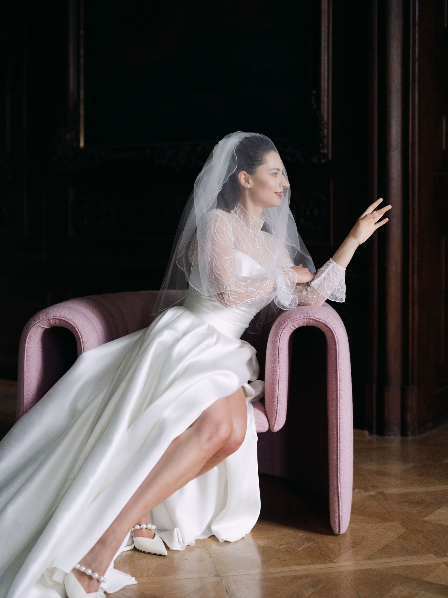 Bridal portrait in an elegant Austrian castle featuring timeless architecture and luxurious details, captured during a destination wedding