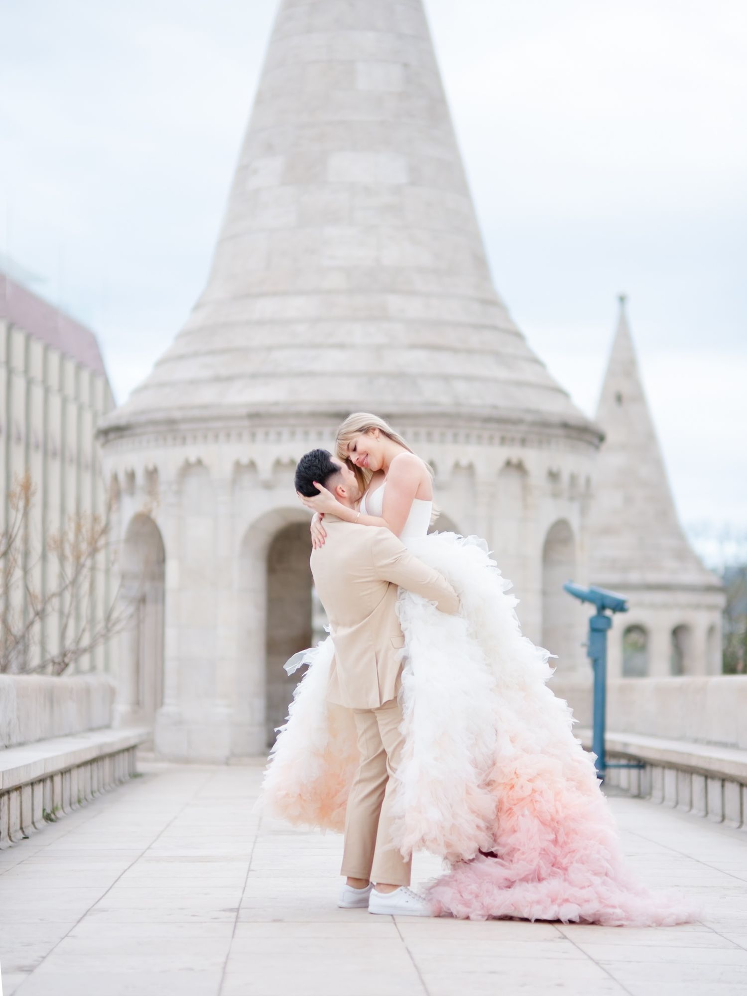 Graceful couple posing romantically at Fisherman’s Bastion during an elopement shoot, beautifully captured by Hang Pham Photography