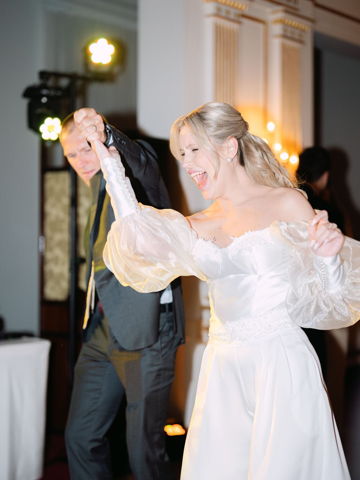 Elegant destination wedding party moments and dancing at Gundel Restaurant in Budapest, capturing the vibrant celebration and luxury setting