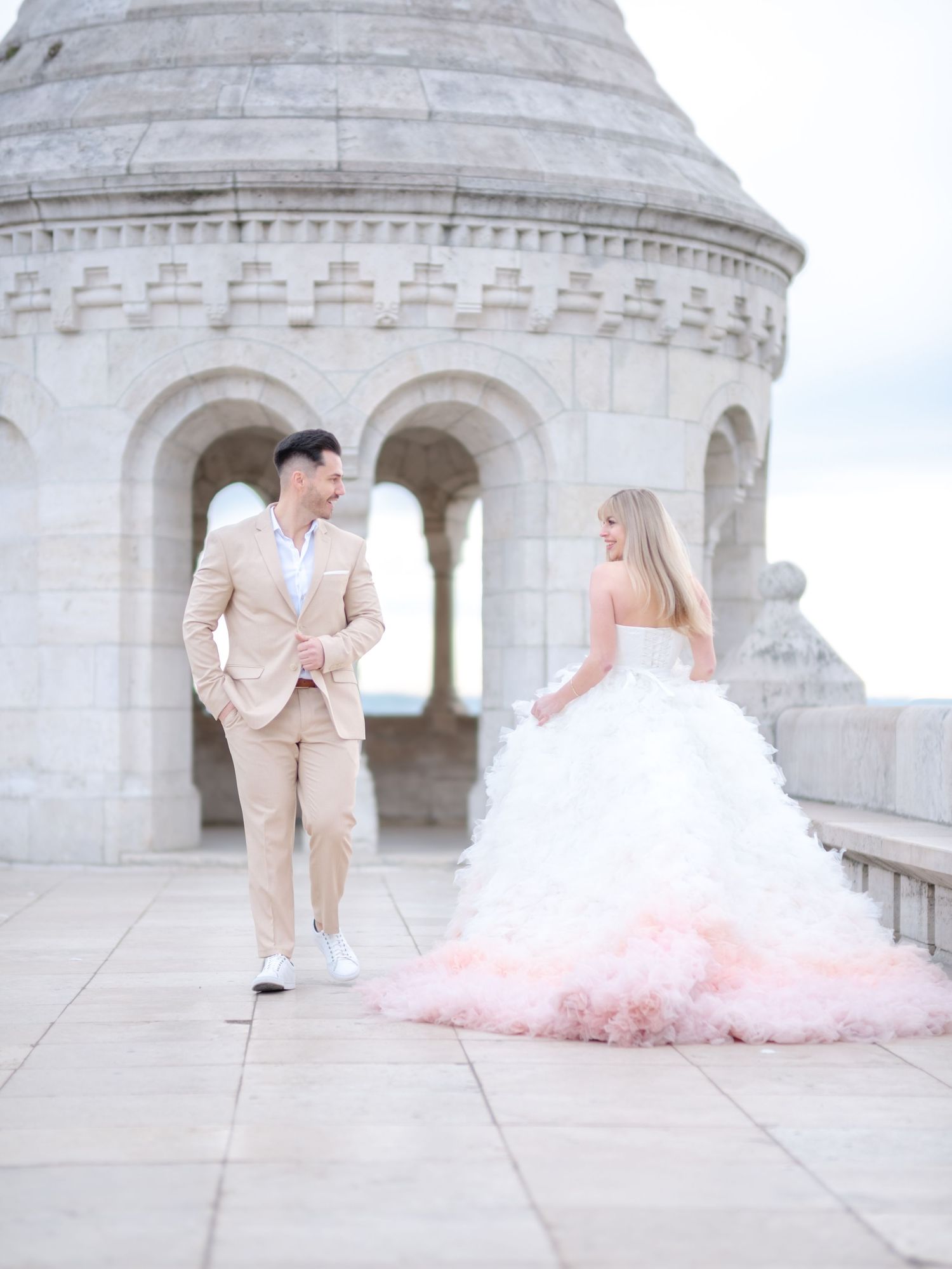 Graceful couple posing romantically at Fisherman’s Bastion during an elopement shoot, beautifully captured by Hang Pham Photography