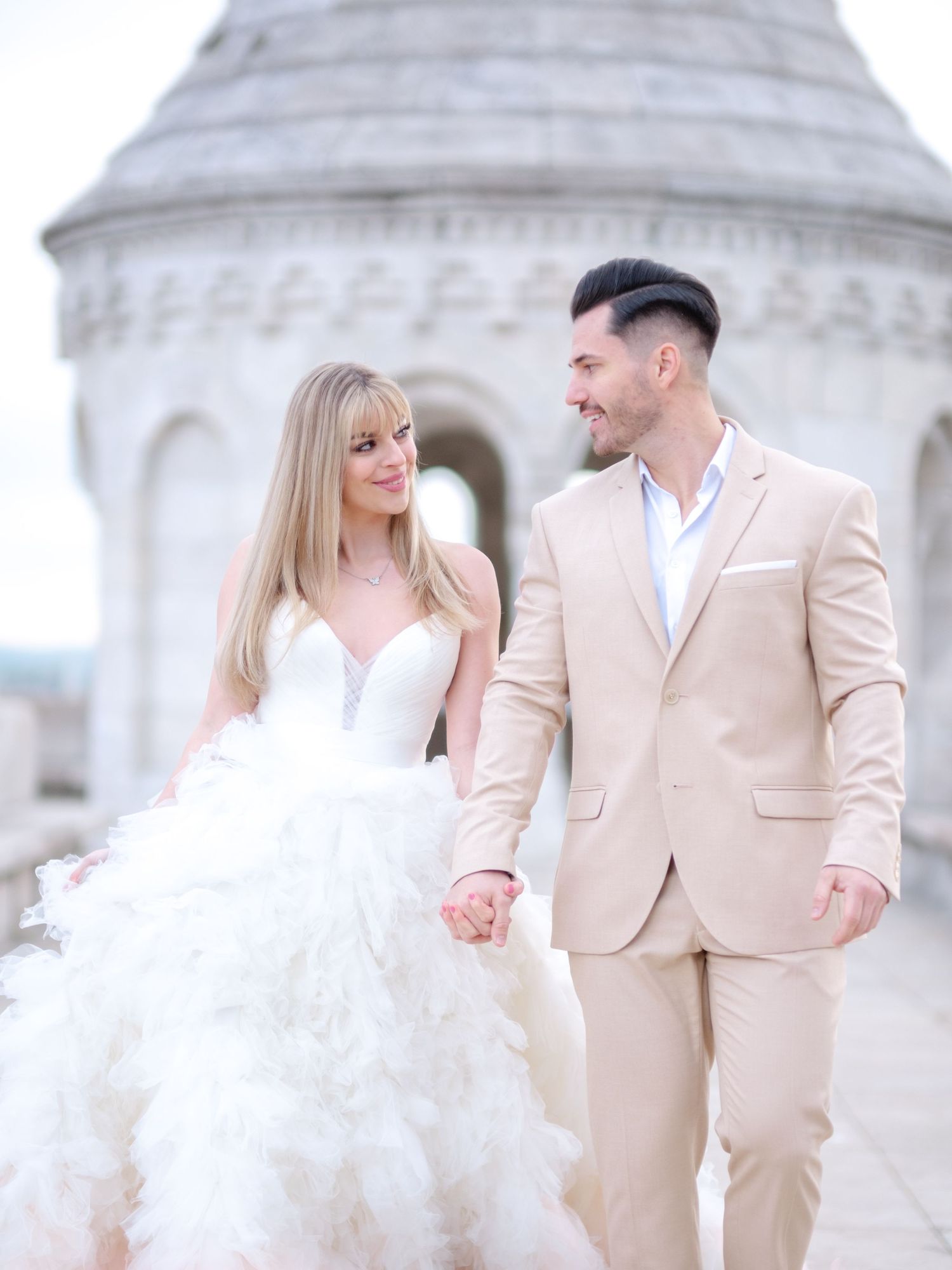 Graceful couple posing romantically at Fisherman’s Bastion during an elopement shoot, beautifully captured by Hang Pham Photography