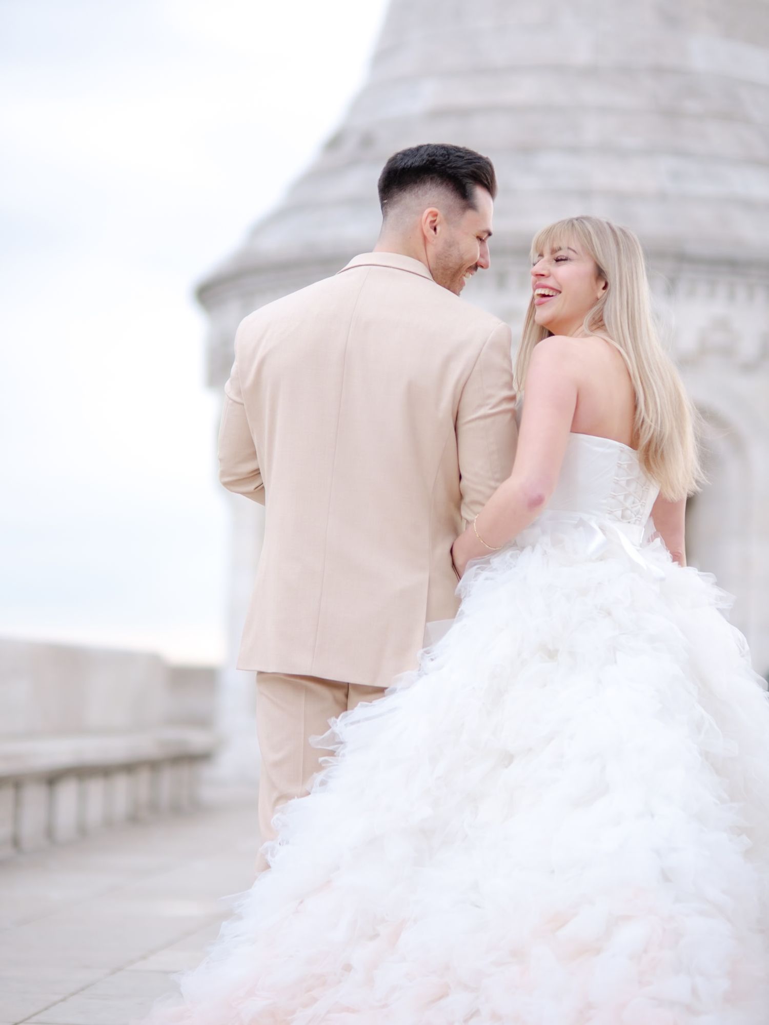 Graceful couple posing romantically at Fisherman’s Bastion during an elopement shoot, beautifully captured by Hang Pham Photography