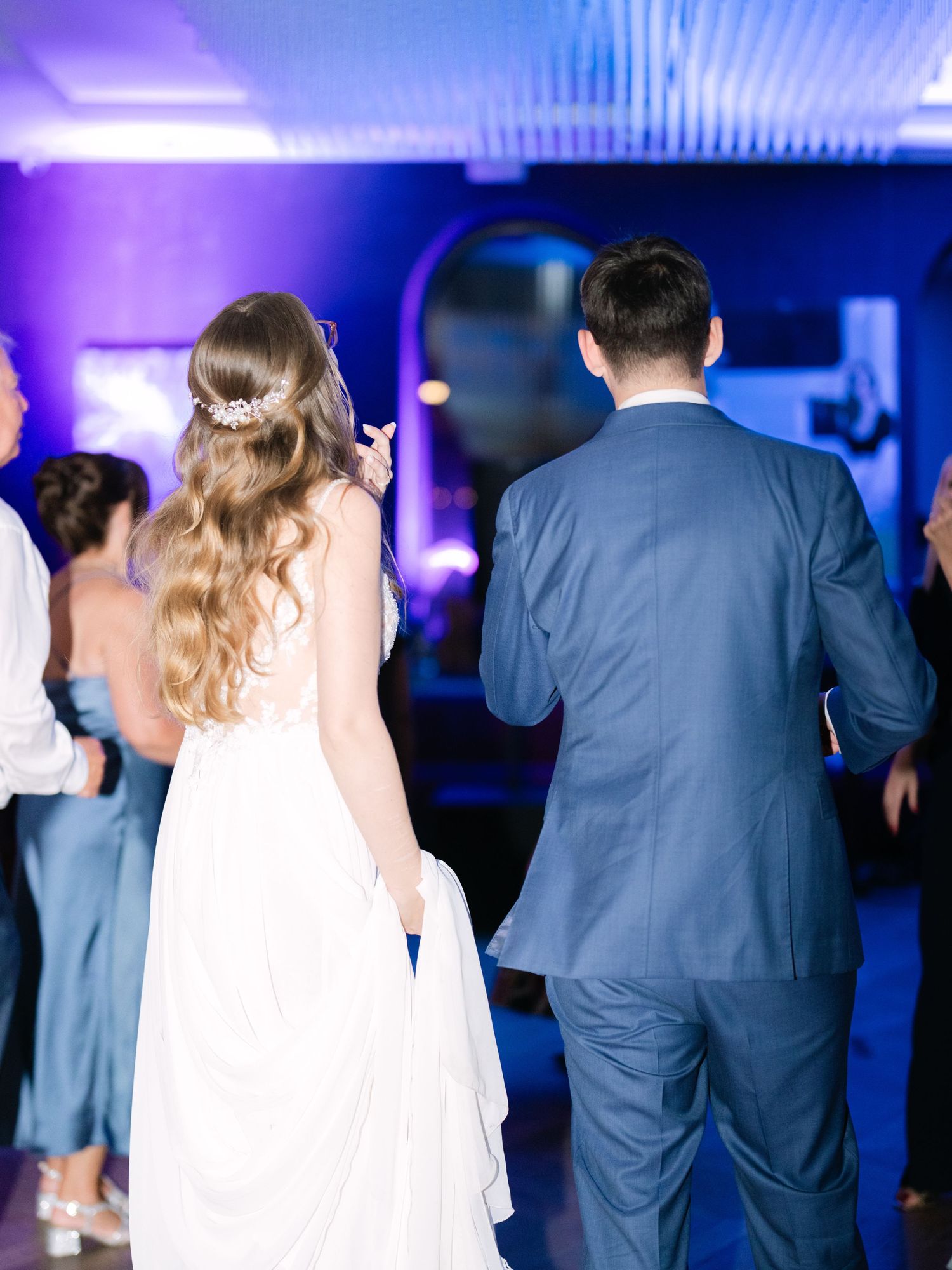 Vibrant party scene at an intimate destination wedding hosted at Aranybástya Restaurant in Budapest, capturing joyful celebration moments
