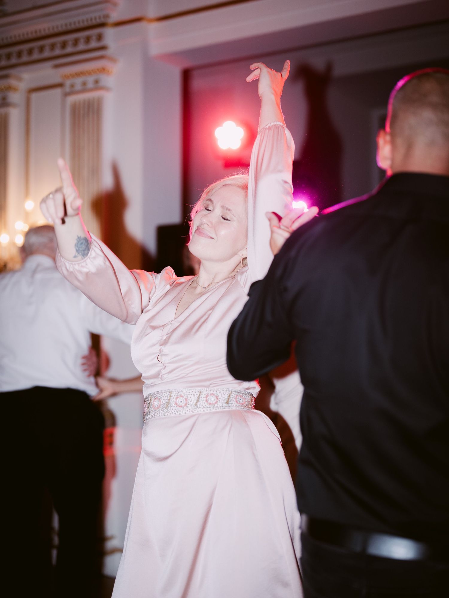Elegant destination wedding party moments and dancing at Gundel Restaurant in Budapest, capturing the vibrant celebration and luxury setting