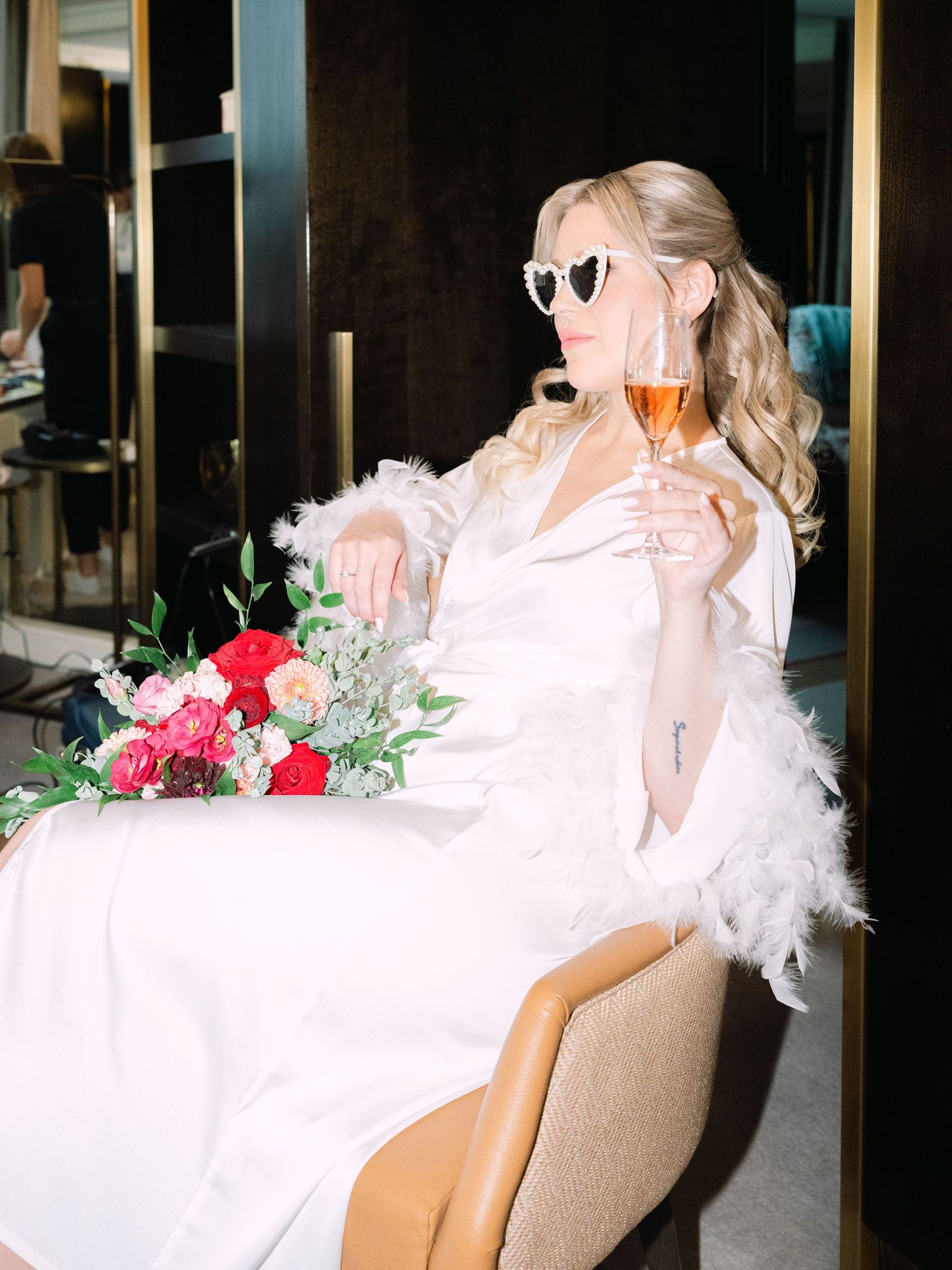 Creative flash shots of a captivating bride in a Hilton Hotel suite in Budapest, styled for an intimate luxury destination wedding