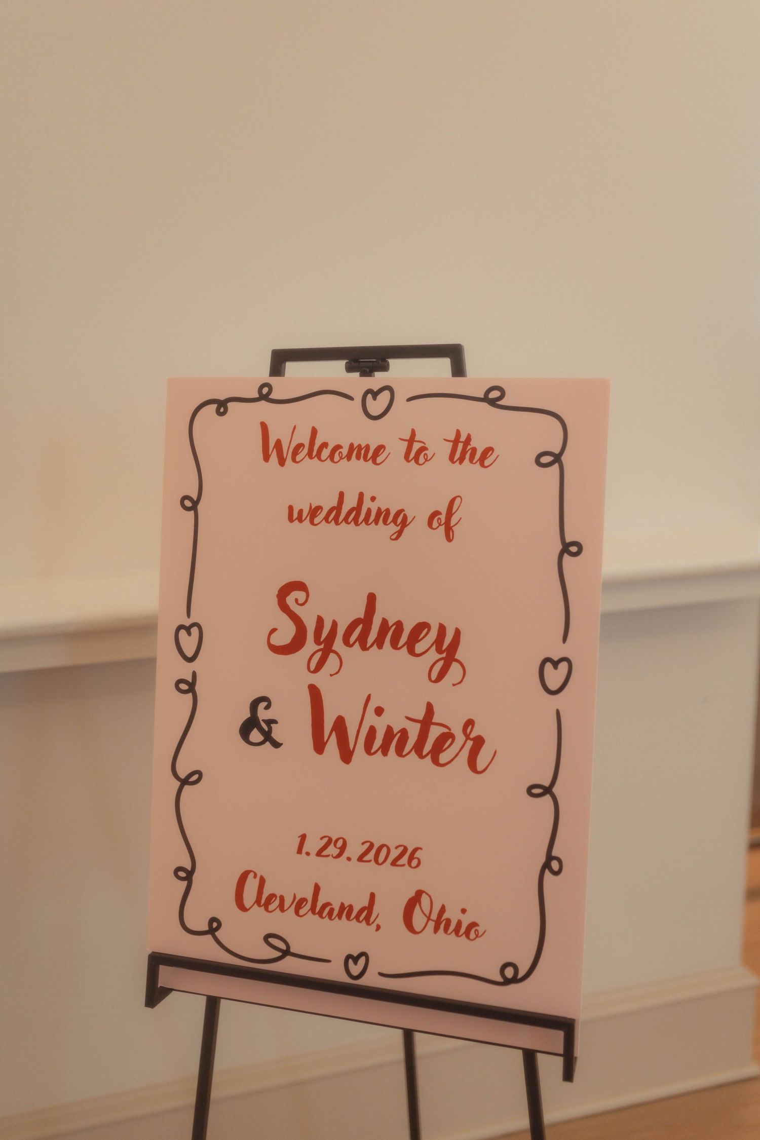 Wedding welcome sign for Sydney & Winter on an easel, dated 1.29.2026 in Cleveland, Ohio.