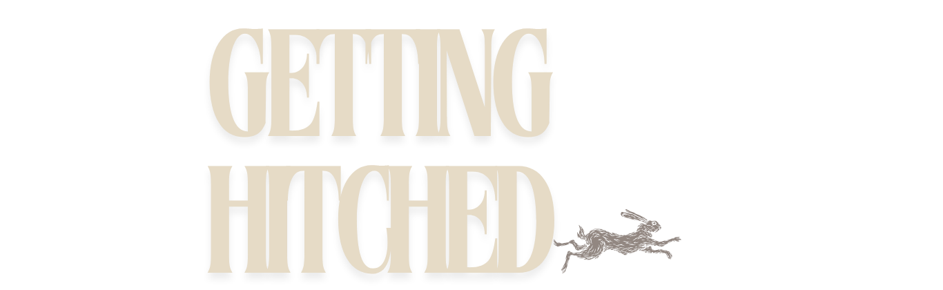 Getting Hitched logo in elegant gold Art Deco typography with a running greyhound dog illustration.