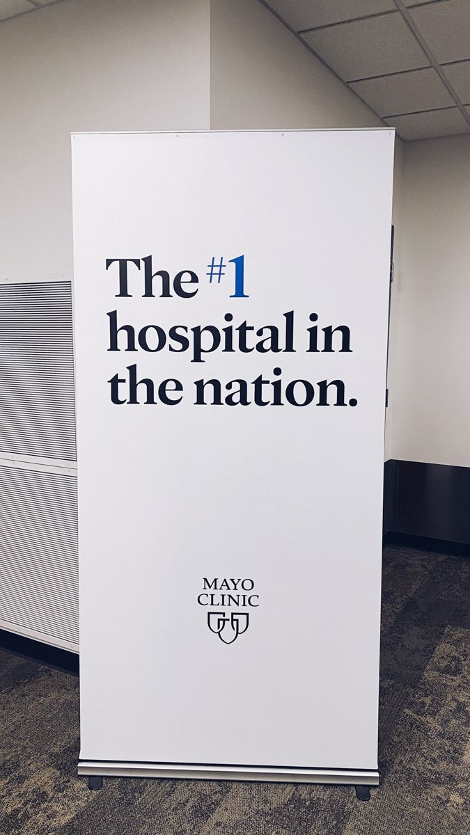 Mayo Clinic sign displaying 'The #1 hospital in the nation' with minimalist design.
